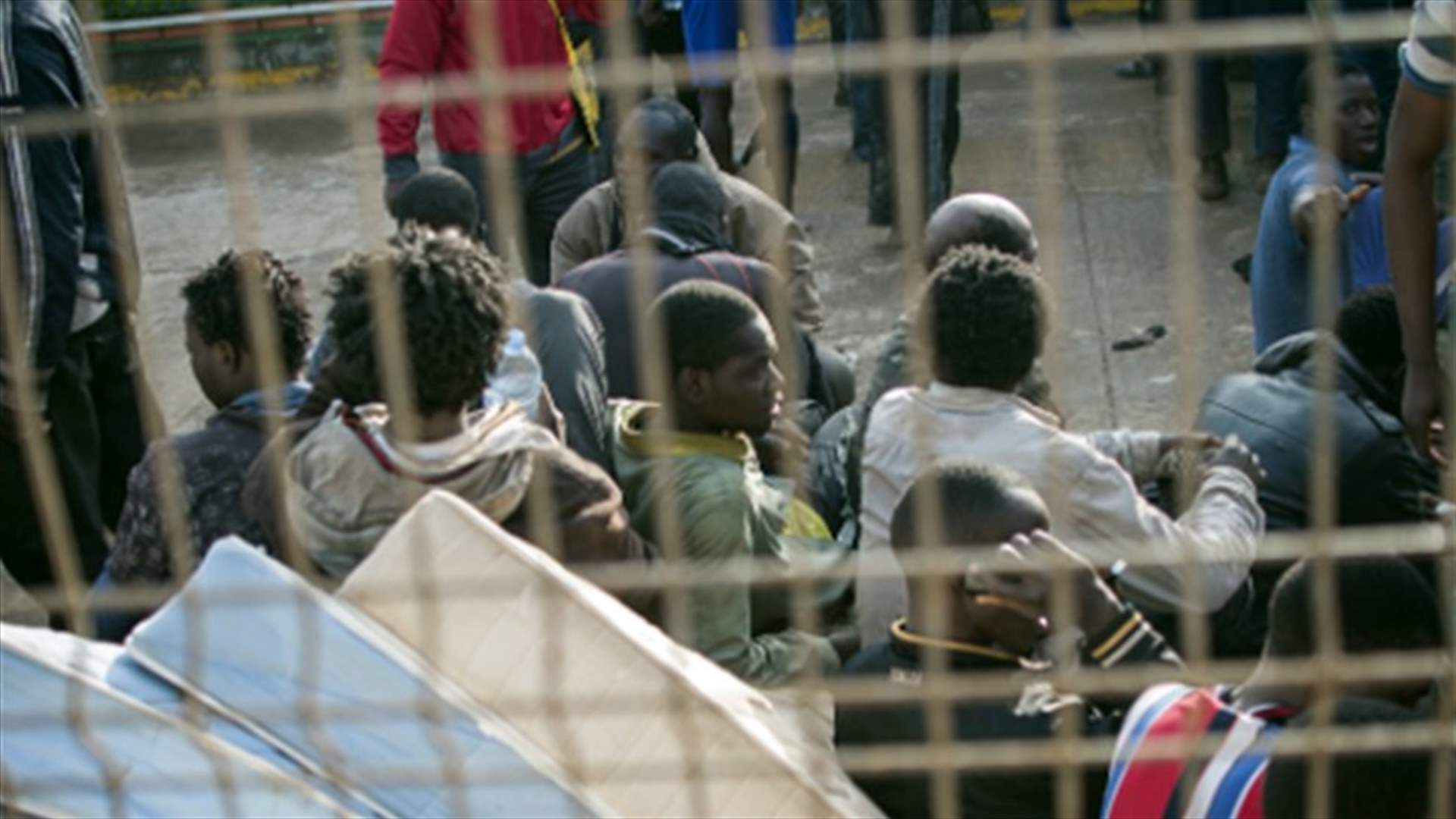 Hundreds of migrants try to storm border into Spain&#39;s enclave of Ceuta