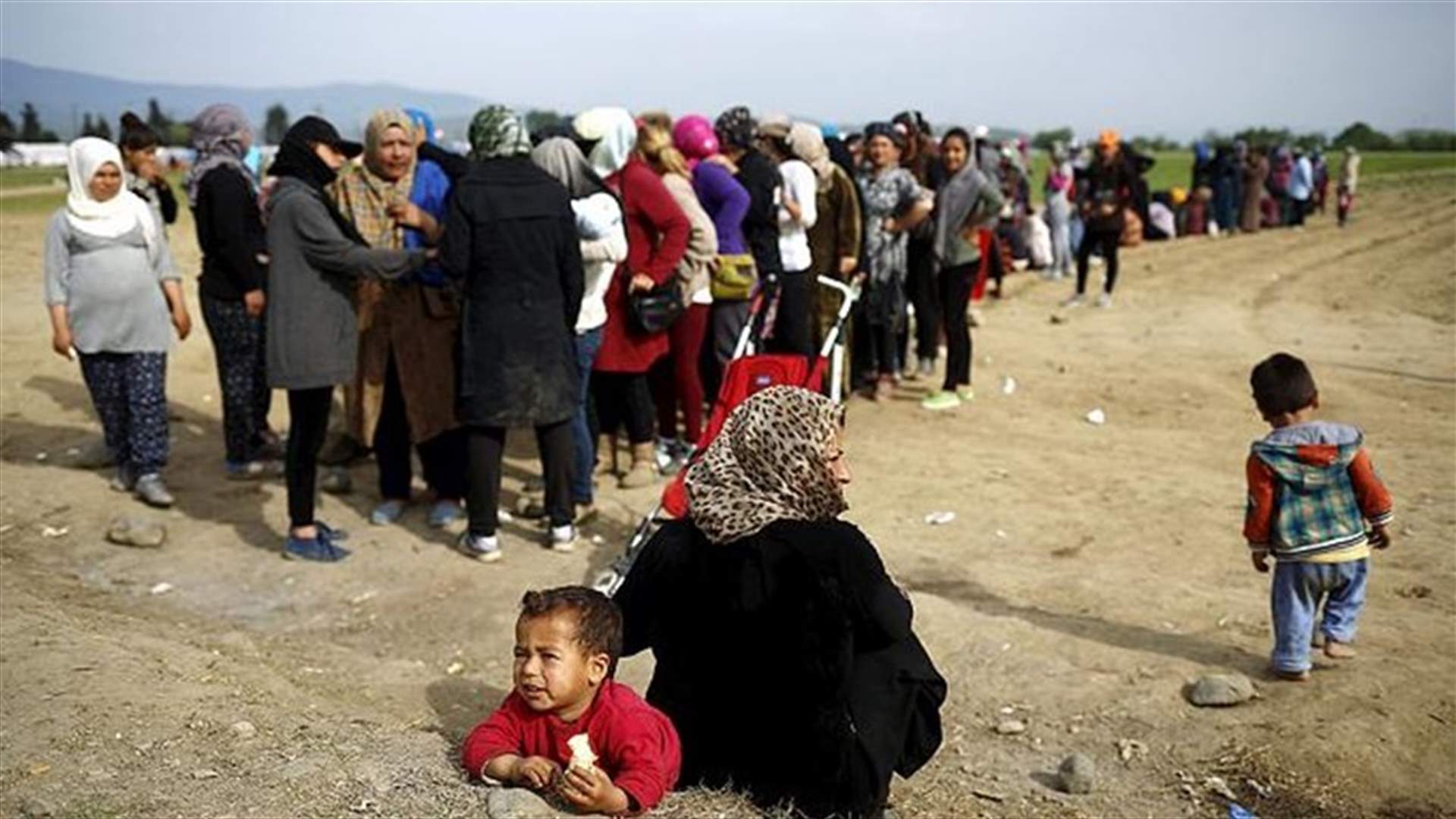 Stranded migrants in Greek camp protest over living conditions