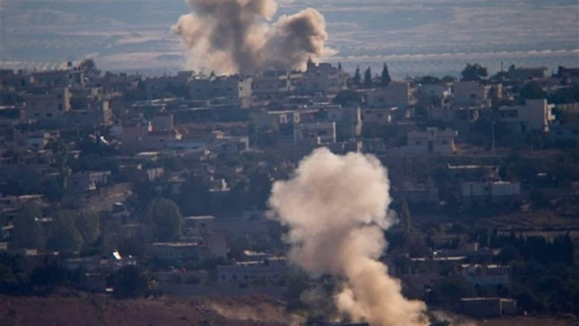 Syrian jets wage deadly strikes on rebel-held Homs district