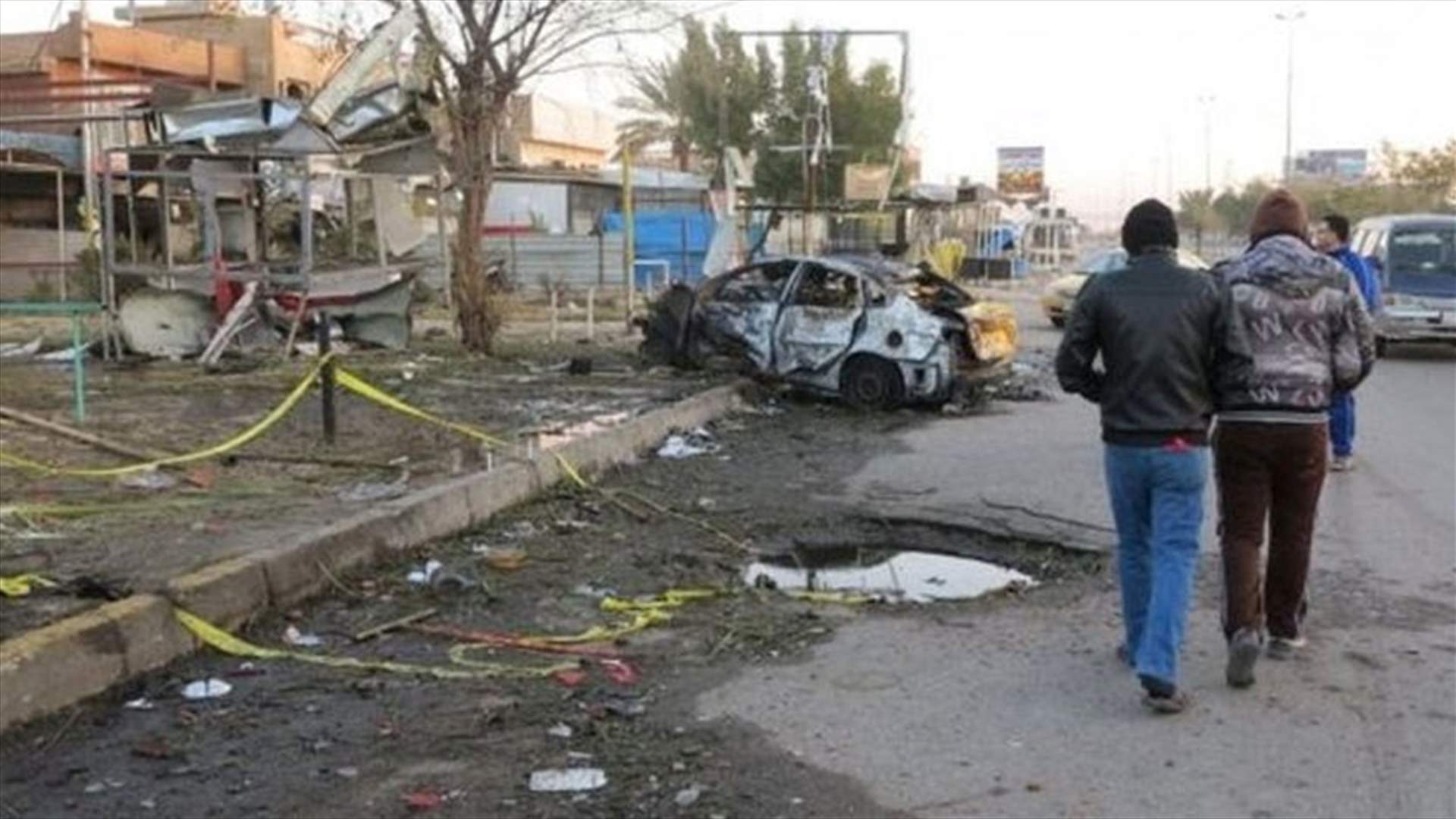 Baghdad car bomb kills at least 18, wounds about 50 - medics
