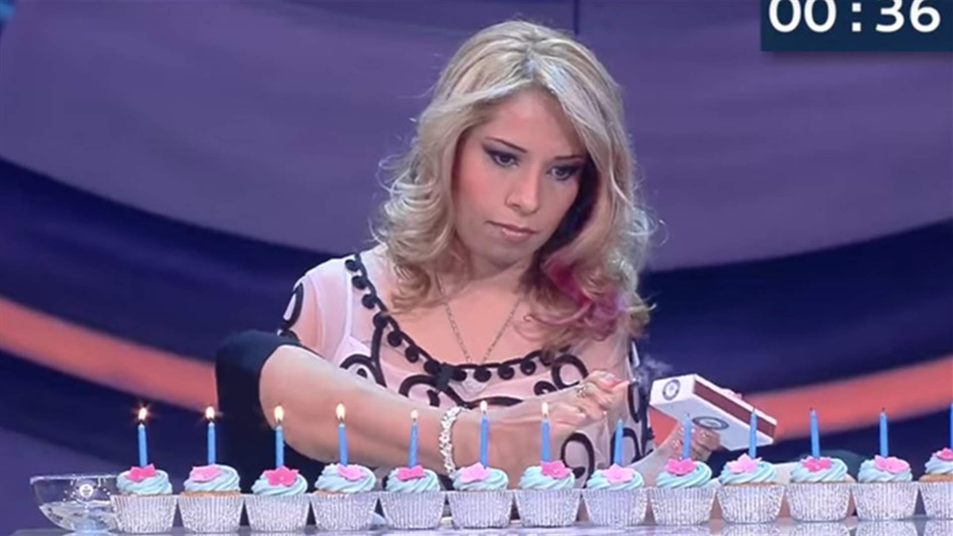 VIDEO: Woman With No Arms Breaks World Record For Lighting Candles With Feet