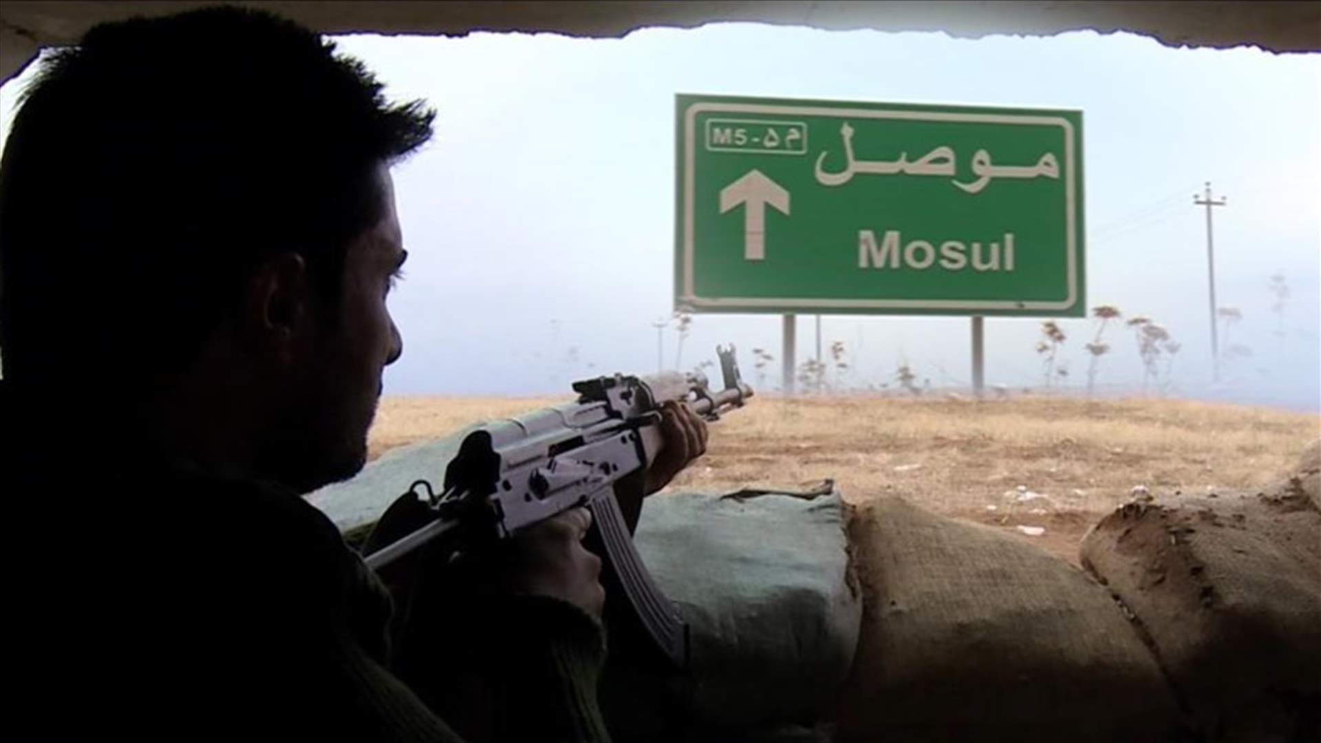 Iraqi forces see off Islamic State attack, seize road out of Mosul