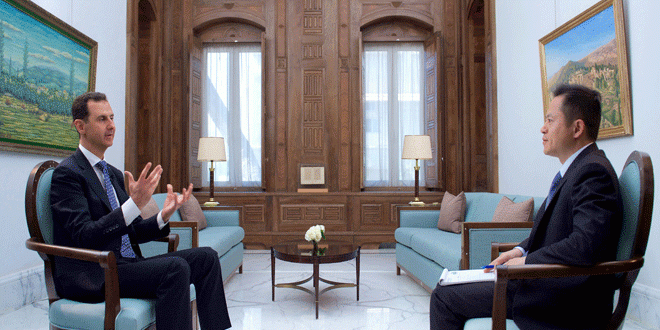 Assad says yet to see real steps from Trump on IS