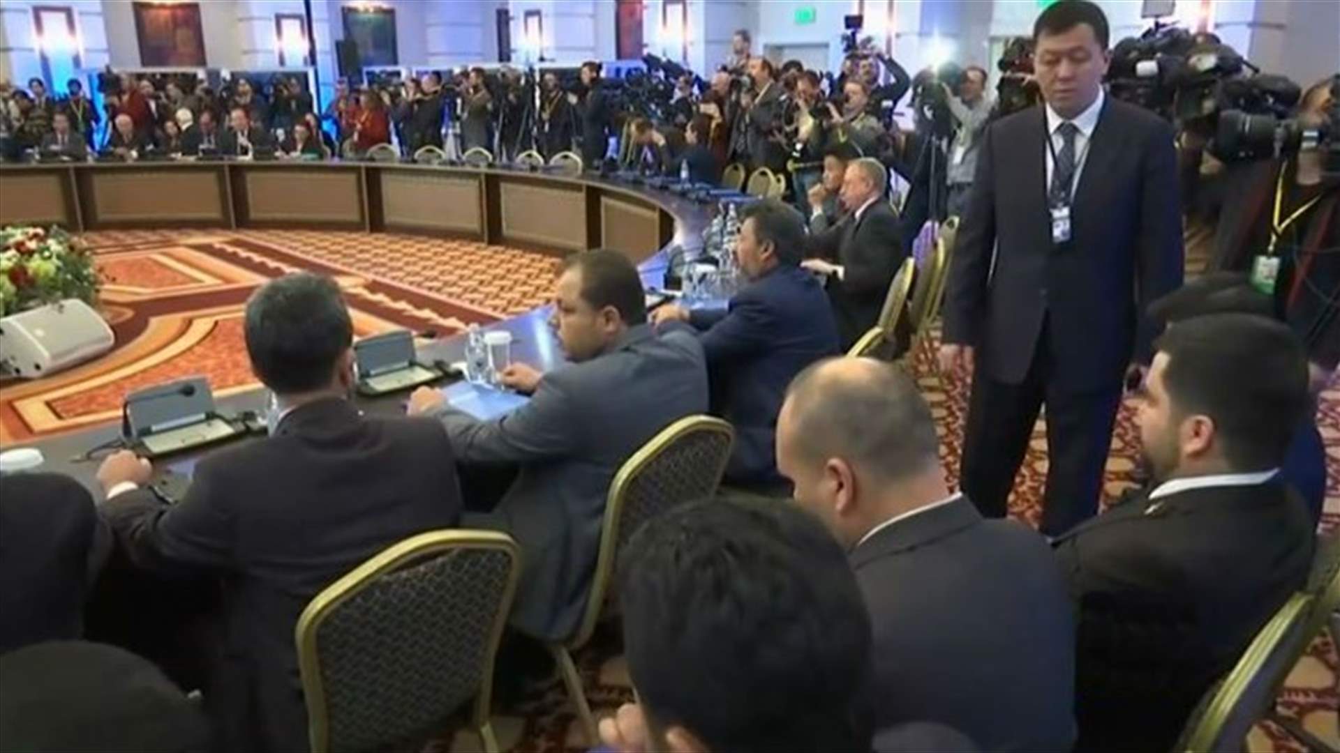 Russia says Syrian government officials will attend Geneva peace talks