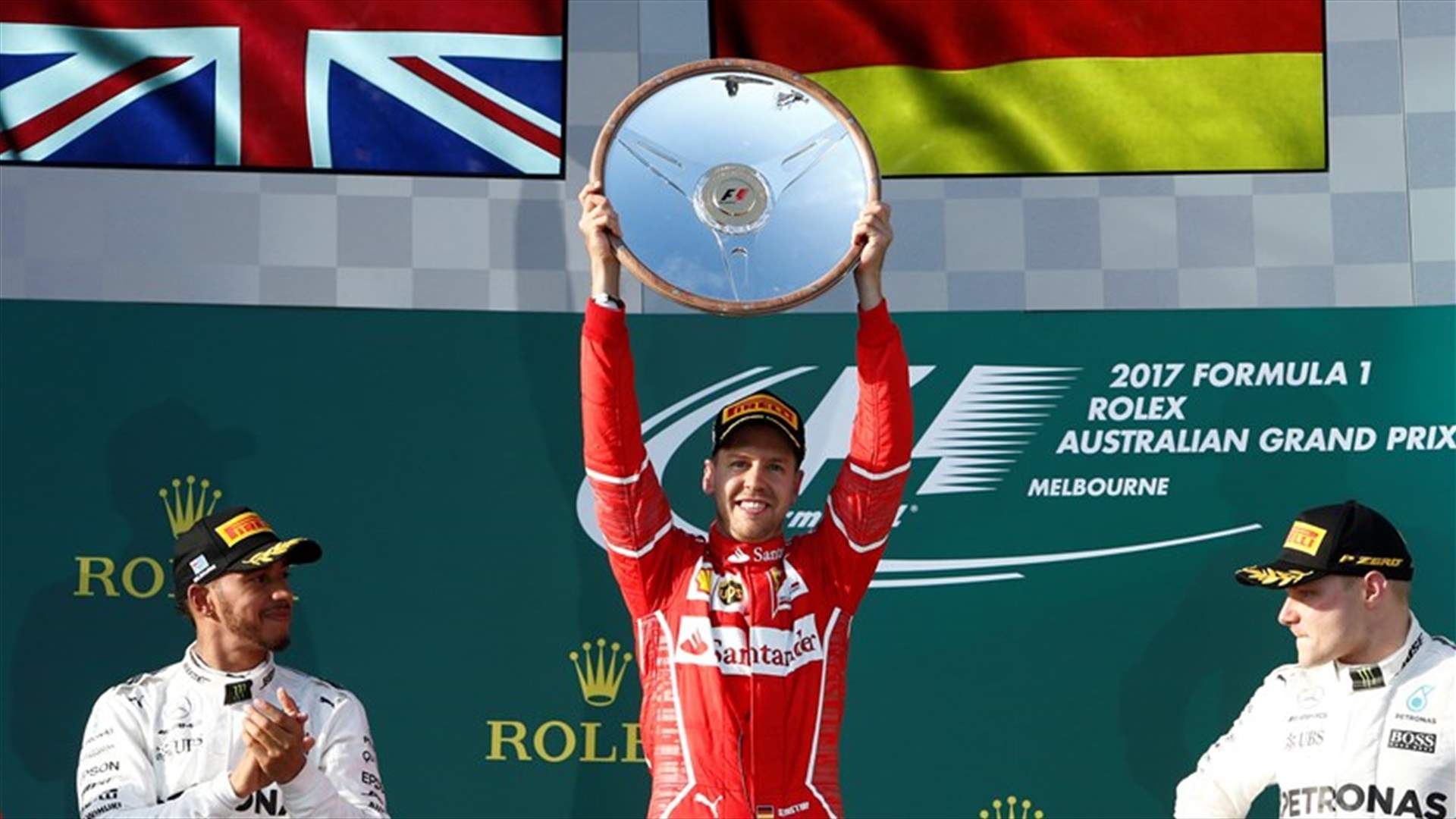 بالصور - سائق الفيراري سيباستيان فيتل يفوز بسباق جائزة استراليا الكبرى الافتتاحي