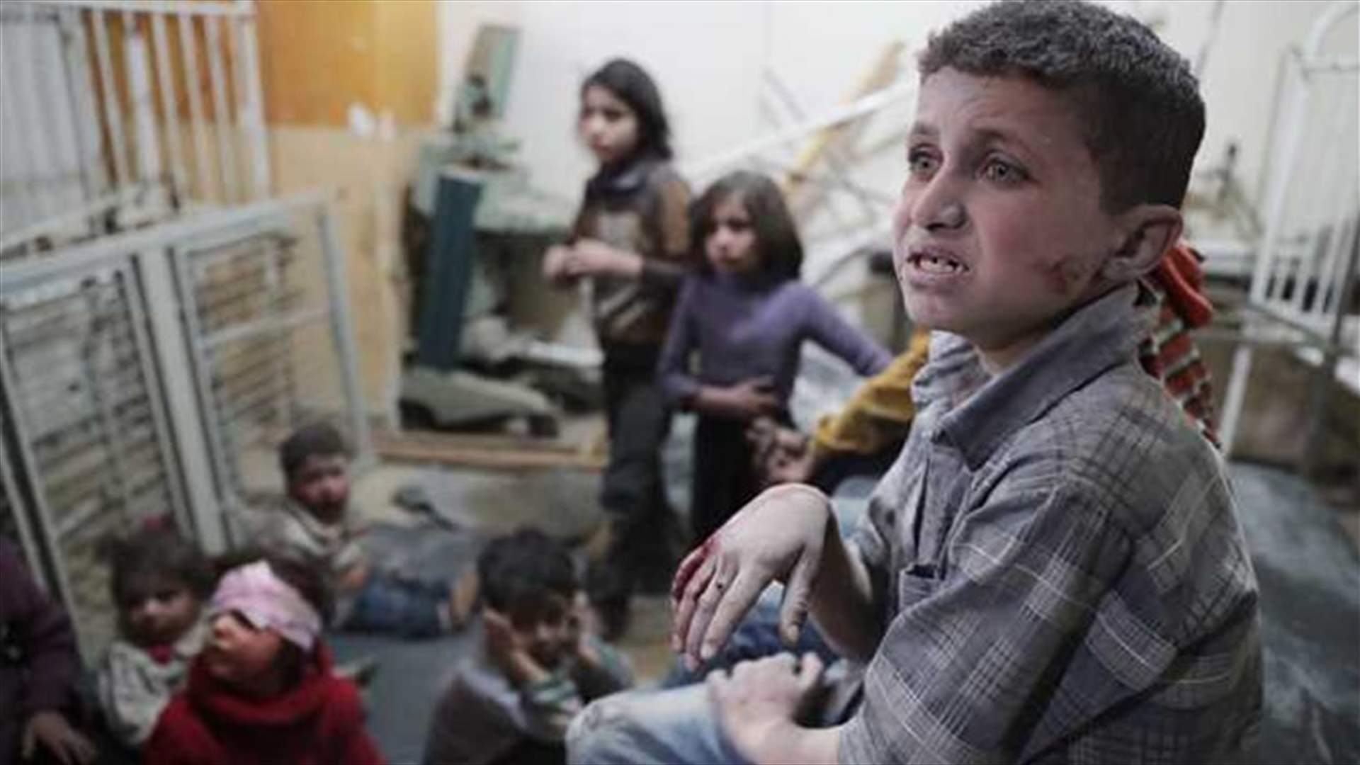 Warplane hits Syrian town where gas attack killed scores - witness, Observatory