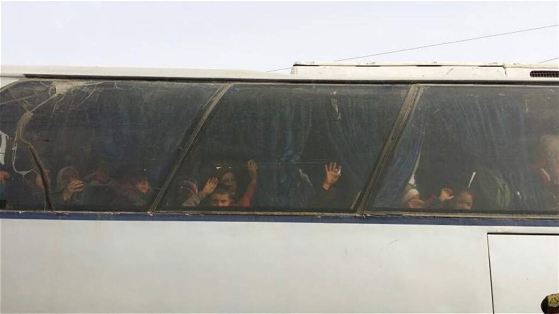 Evacuations of besieged Syrians resume after two-day halt