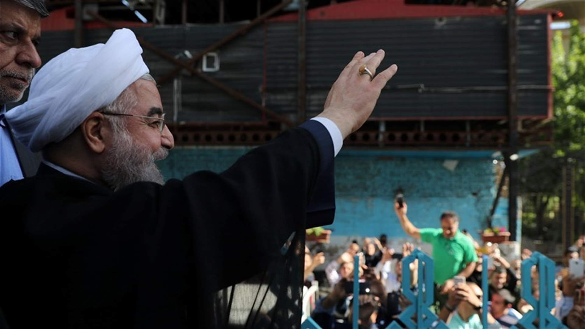 Decisively re-elected, Rouhani defies hardliners, pledges to open Iran