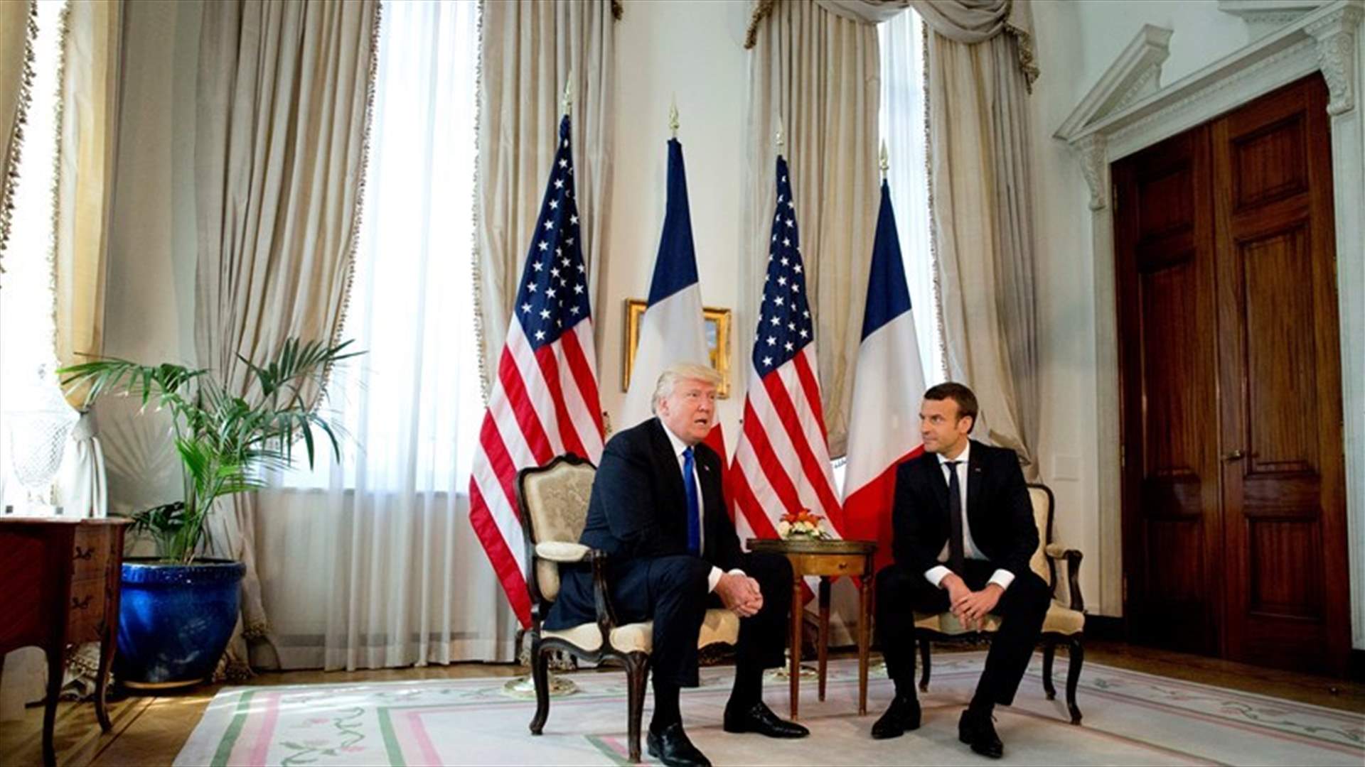 Trump, Macron engage in a little handshake diplomacy