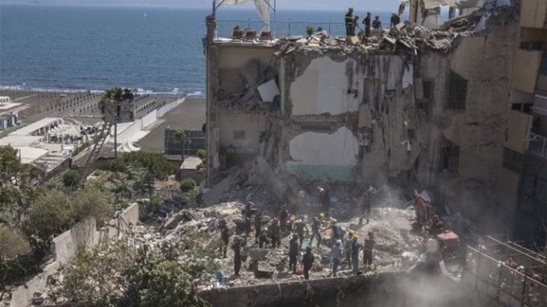 Eight bodies found under collapsed building in Italy