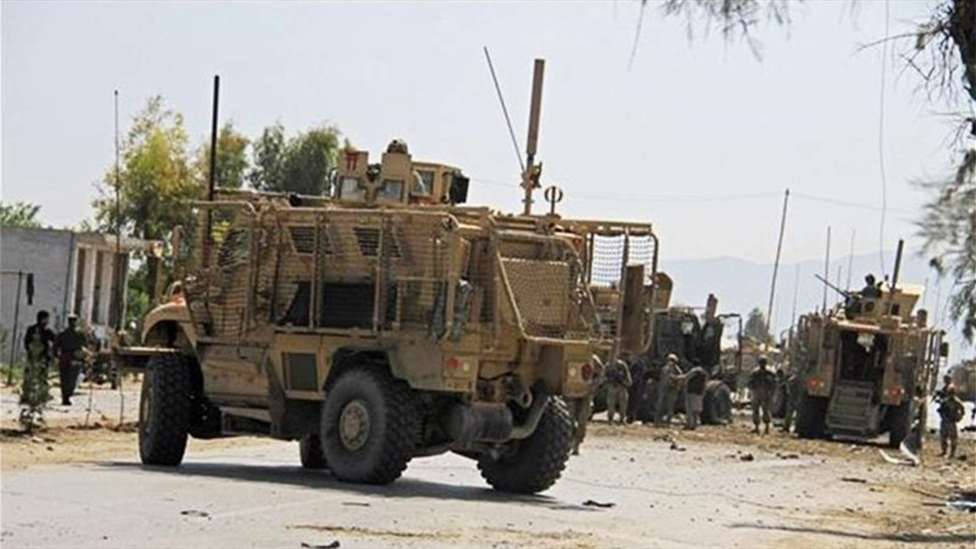 Car bomber hits NATO convoy in Afghanistan, wounds five civilians