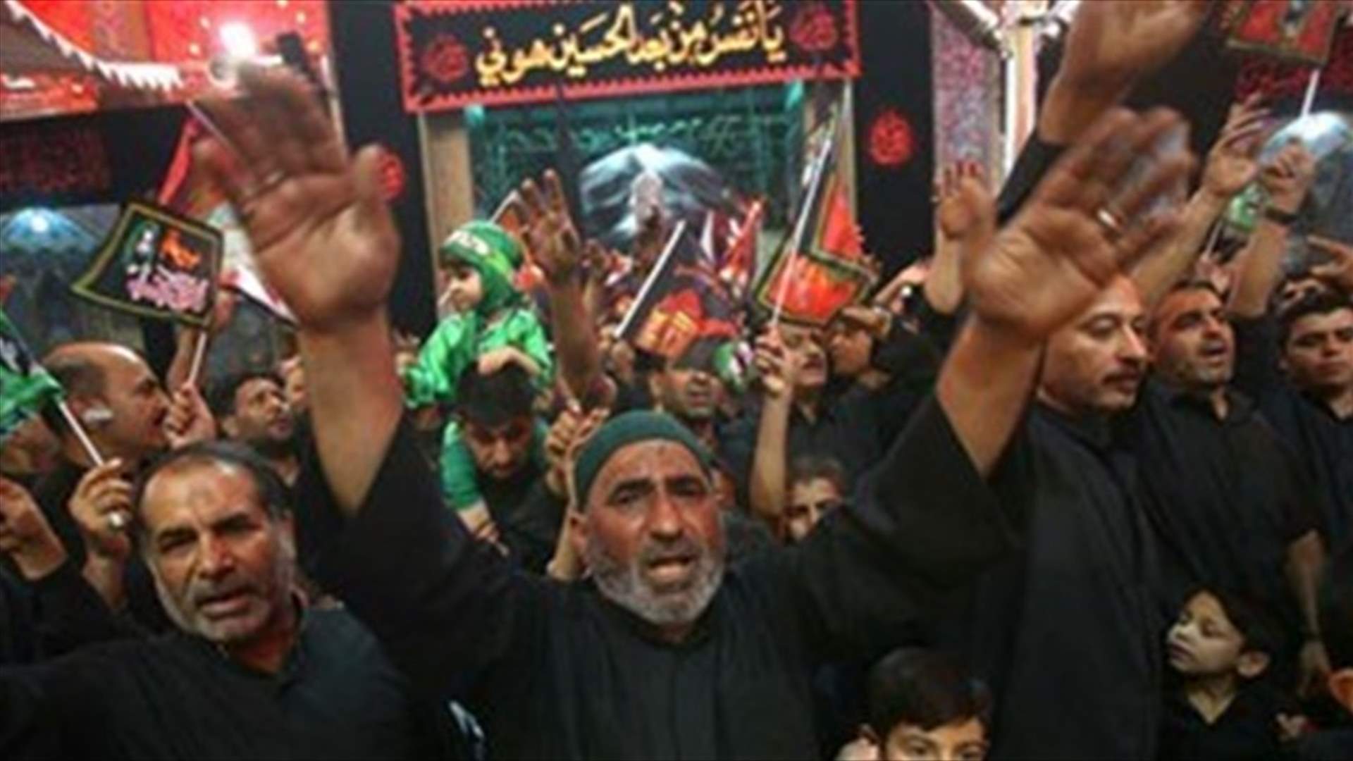 شعارات معارضة لانفصال كردستان خلال عاشوراء في كربلاء