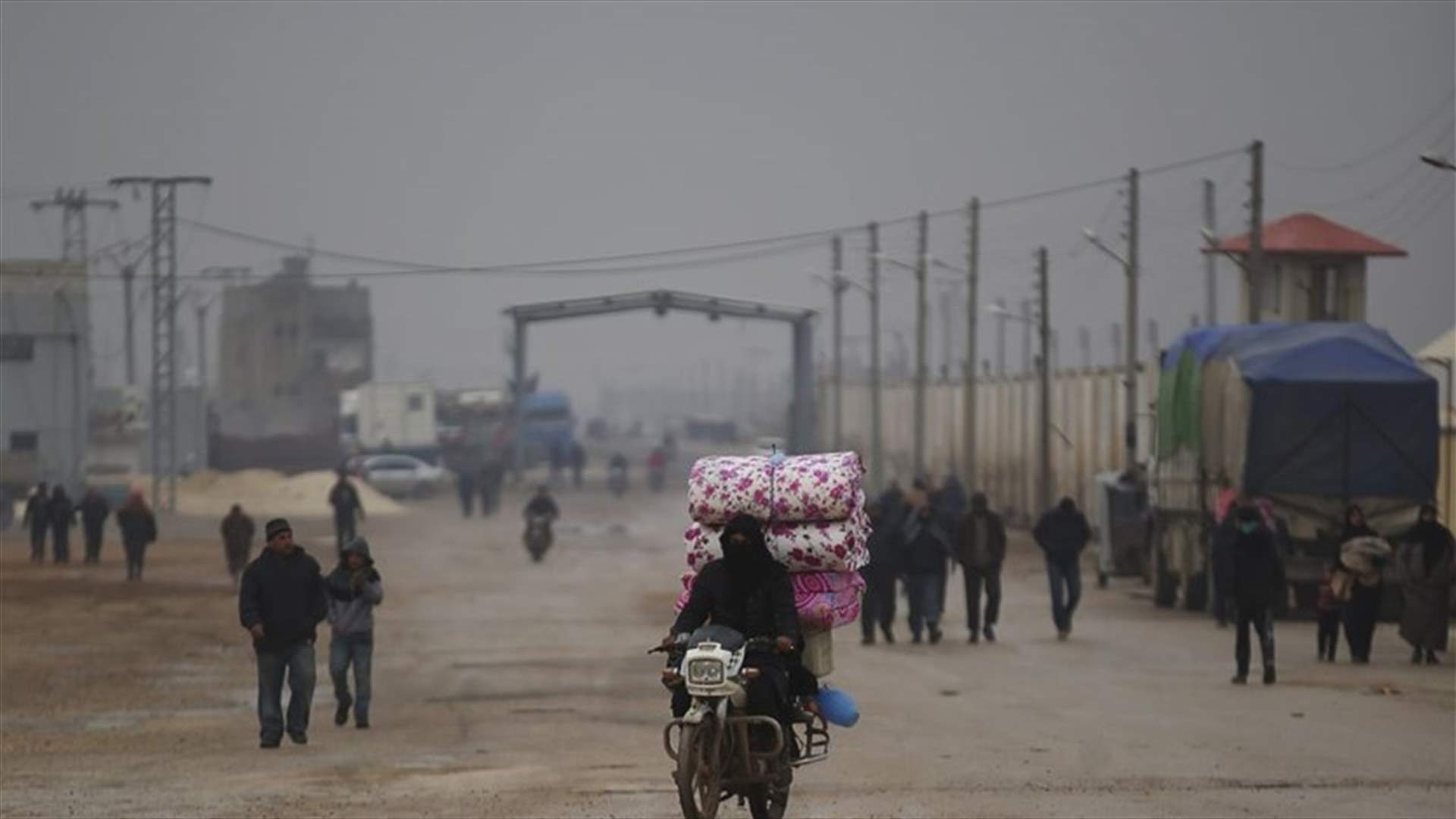 Syrian rebels hand border crossing to opposition government