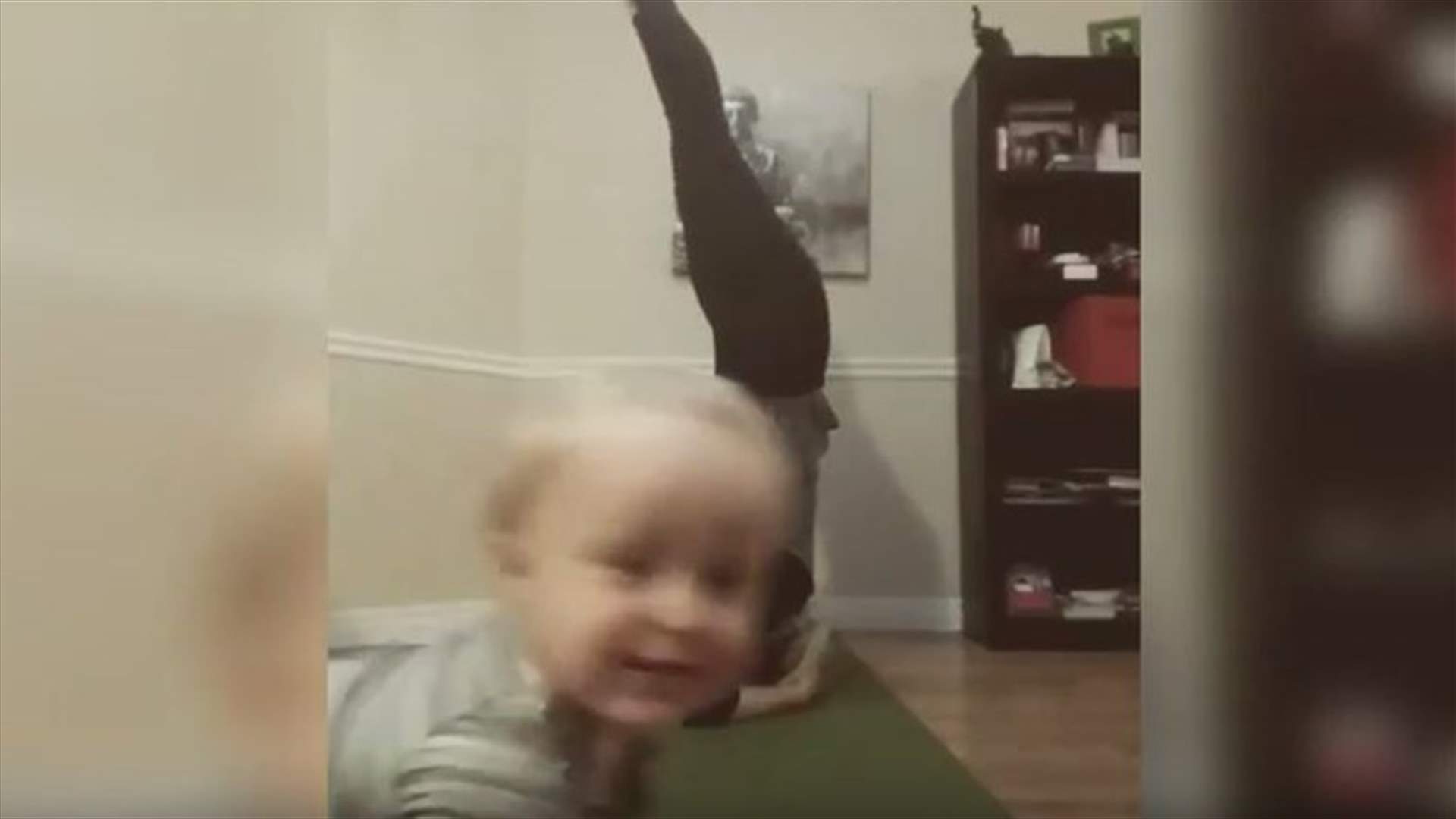 VIDEO - Little Boy Hilariously Photobombs Mum Trying To Film Yoga Moves At Home