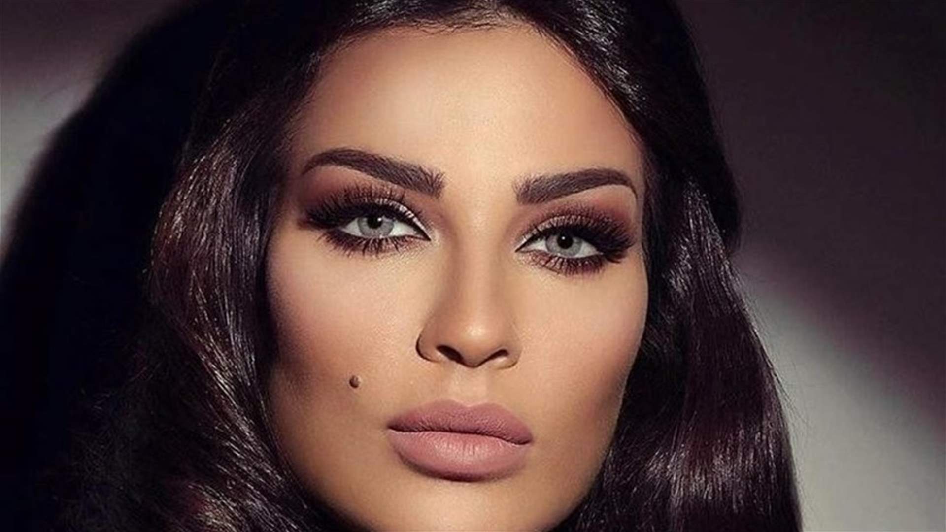 إمرأة مجهولة تثير التساؤلات على حساب نادين نسيب نجيم.. من هي وماذا فعلت؟