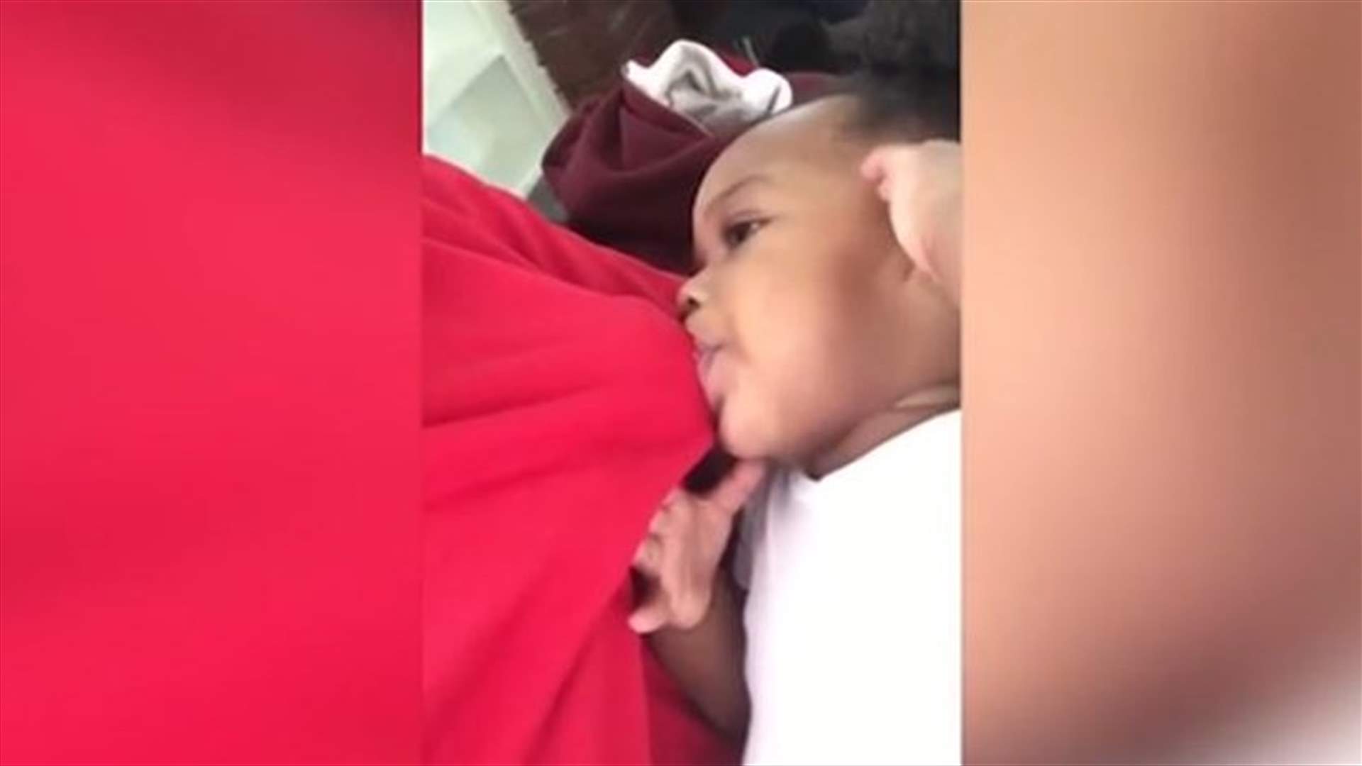 بالفيديو- أب يُرضع طفلته؟!
