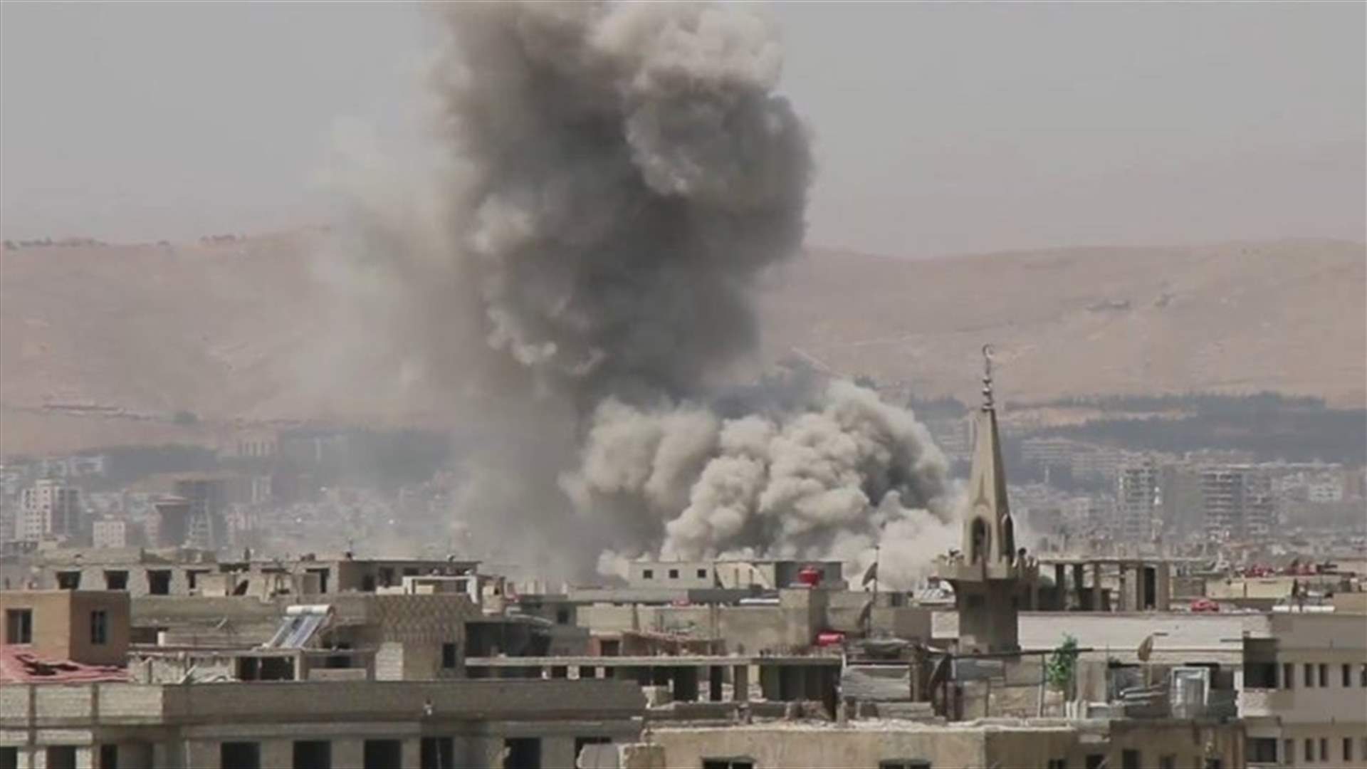 Air strikes pound insurgent enclave close to Damascus
