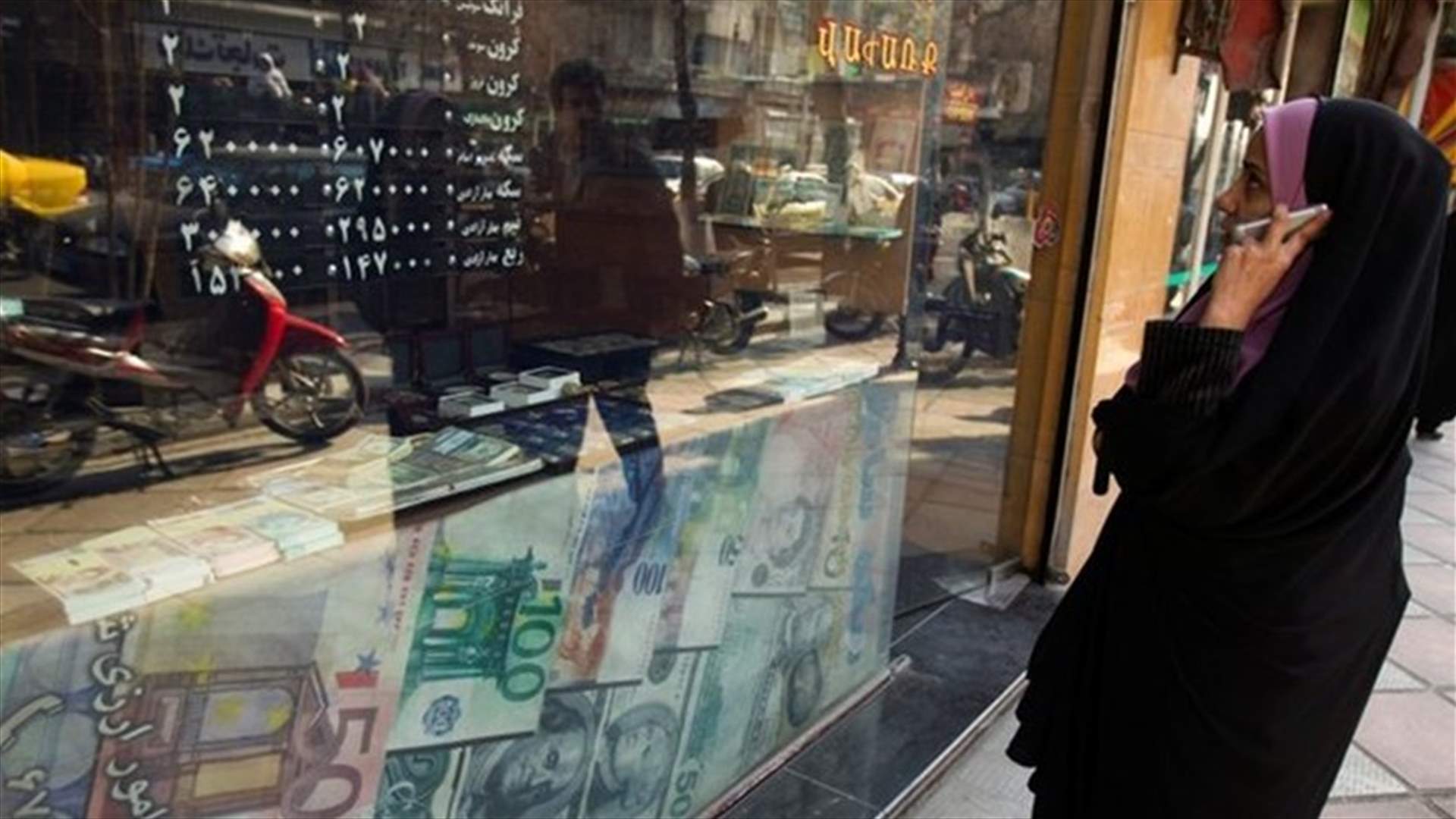 Iran bans 1,300 imports as protesters, police clash over currency weakness