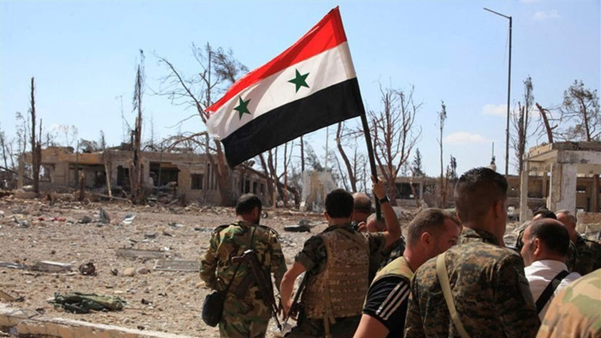 Syrian rebels say army besieges their enclave in the southern city of Deraa