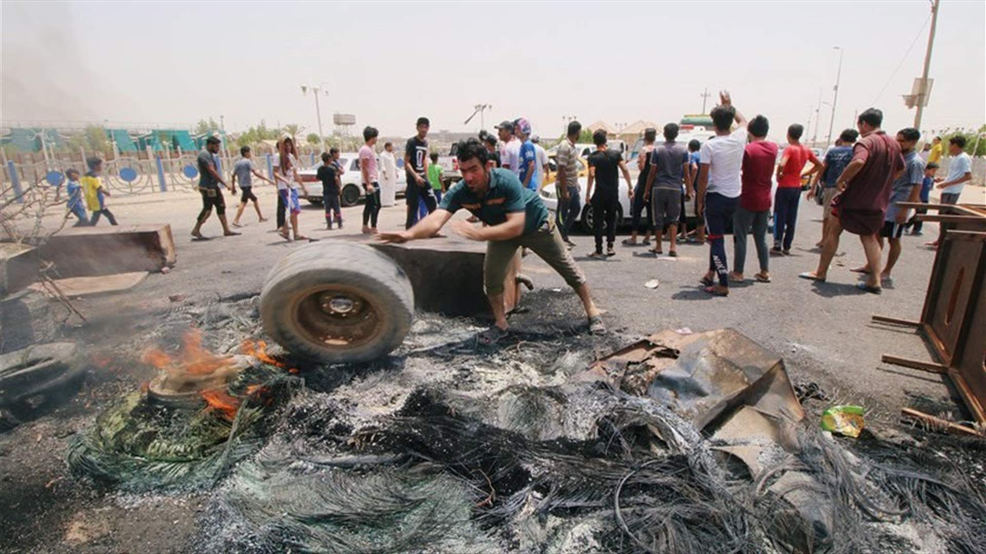 Iraq police fire in air as protesters try to storm Basra govt building
