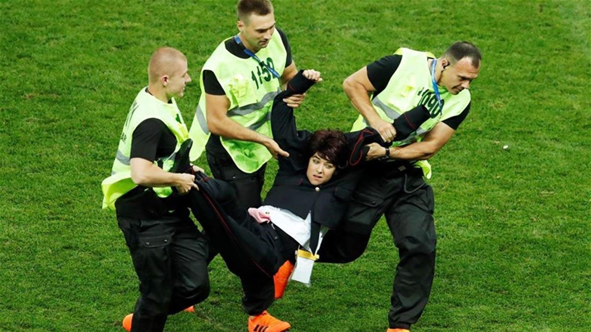 'Pussy Riot' members wore police uniforms in World Cup pitch invasion