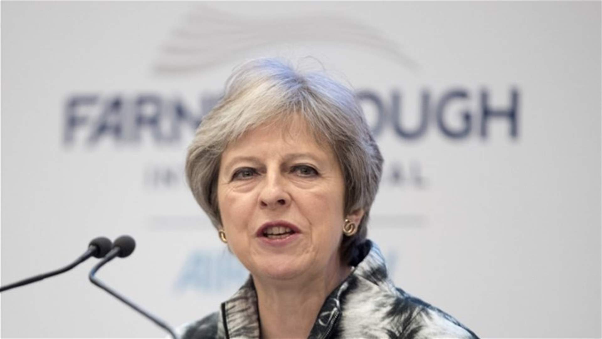 رئيسة وزراء بريطانيا تهدد متمردي حزبها بالدعوة لانتخابات عامة