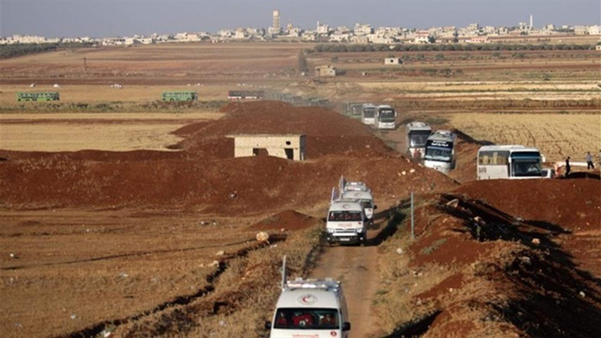 Pro-Assad villages evacuated in deal with Syrian insurgents
