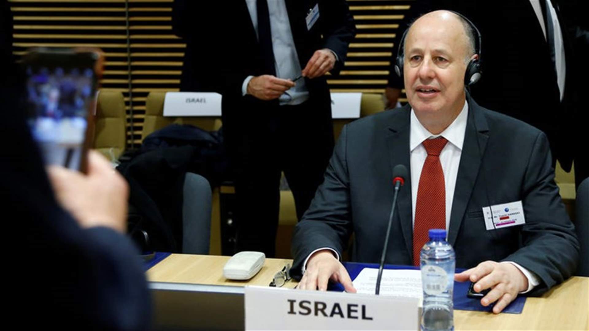 Israeli minister sees end to "stupid" airport grilling of leftists