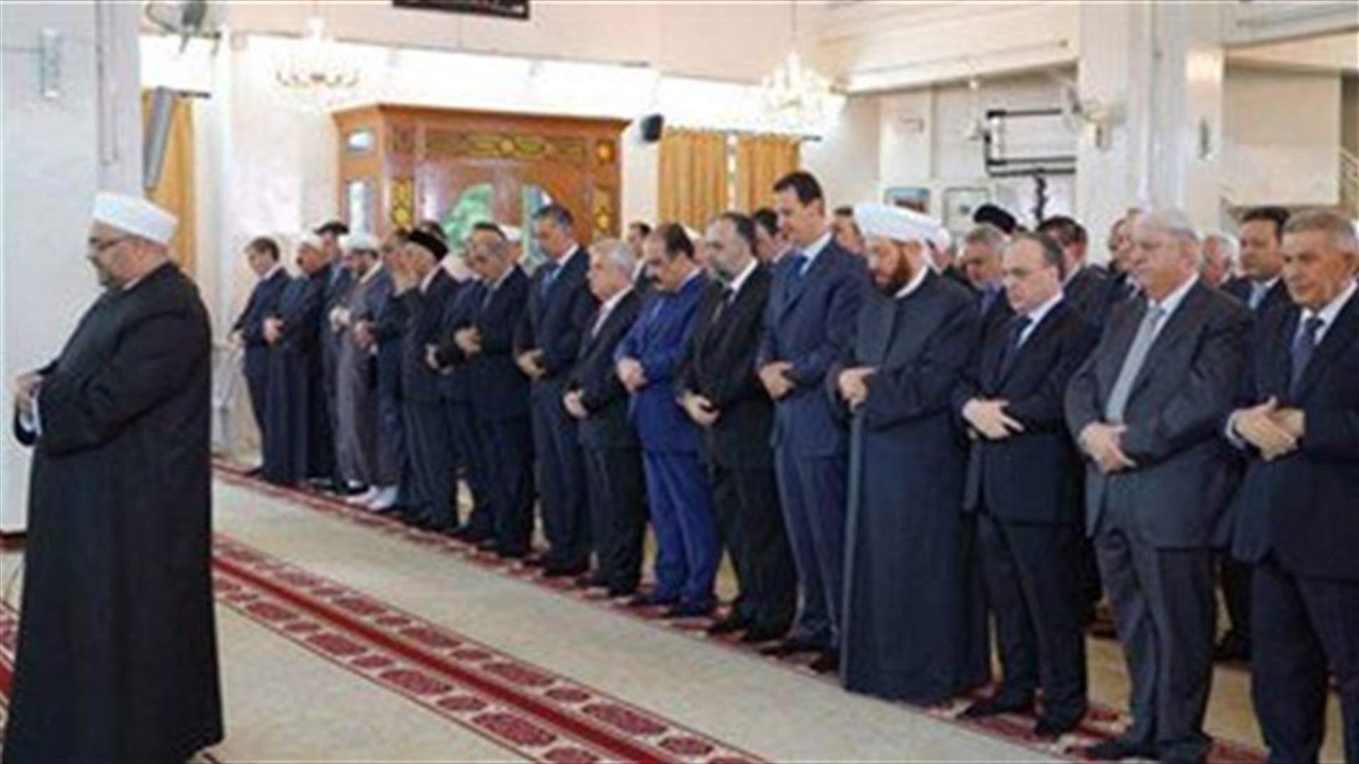 Syria&#39;s President Assad attends Eid al-Adha prayers at Damascus mosque