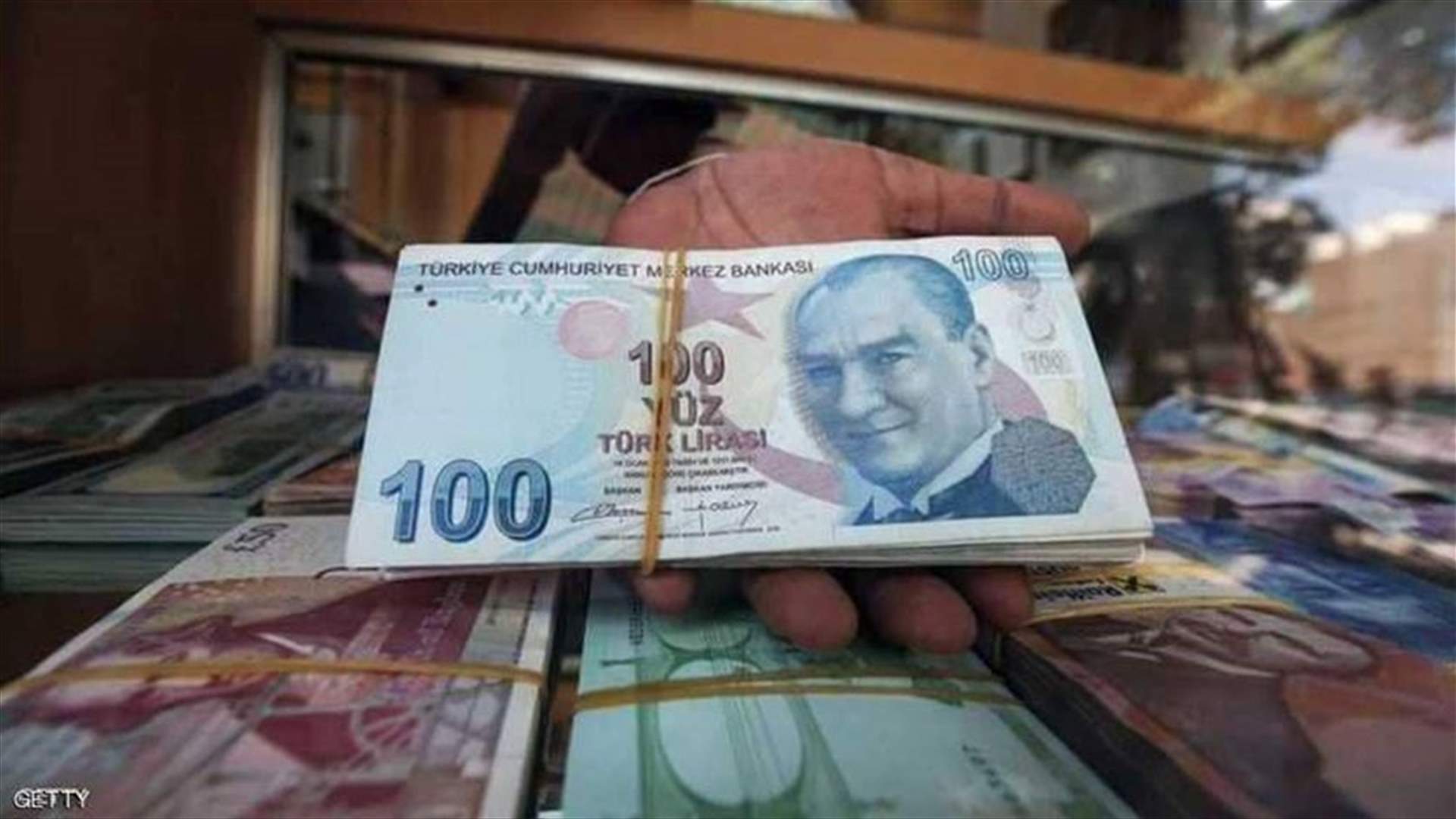 Turkish lira slides 3 percent as markets reopen, eyes on US stand-off