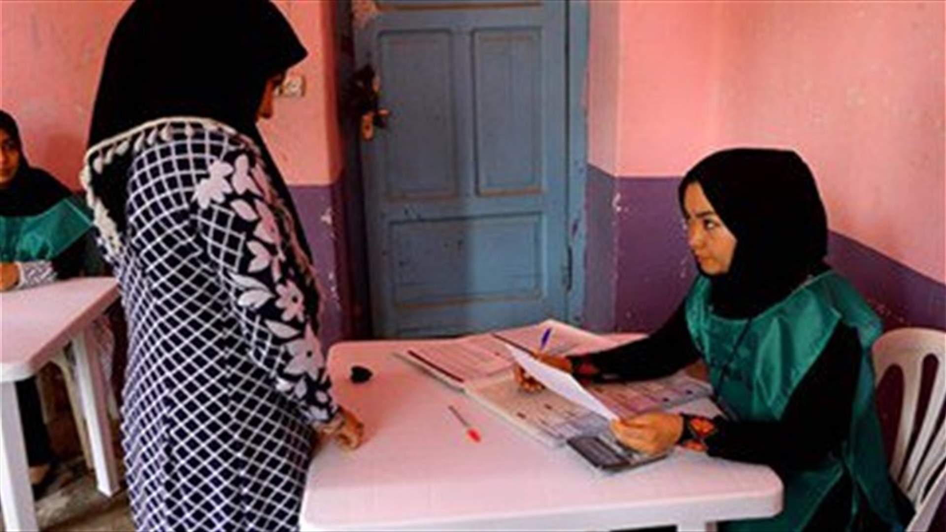 Afghans vote amid chaos, corruption and Taliban threats