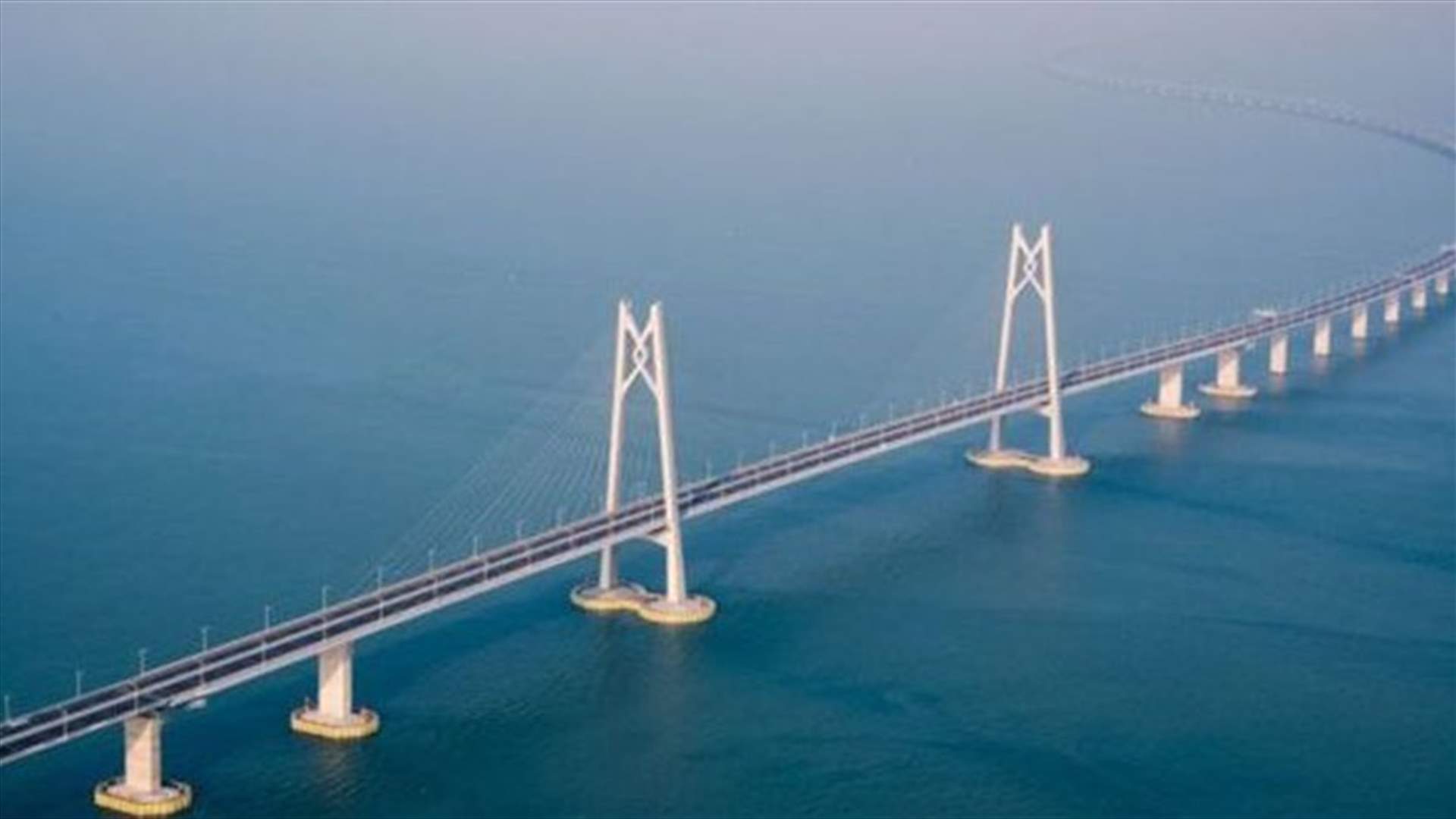 China's Xi opens major sea bridge during symbolic tour to southern China