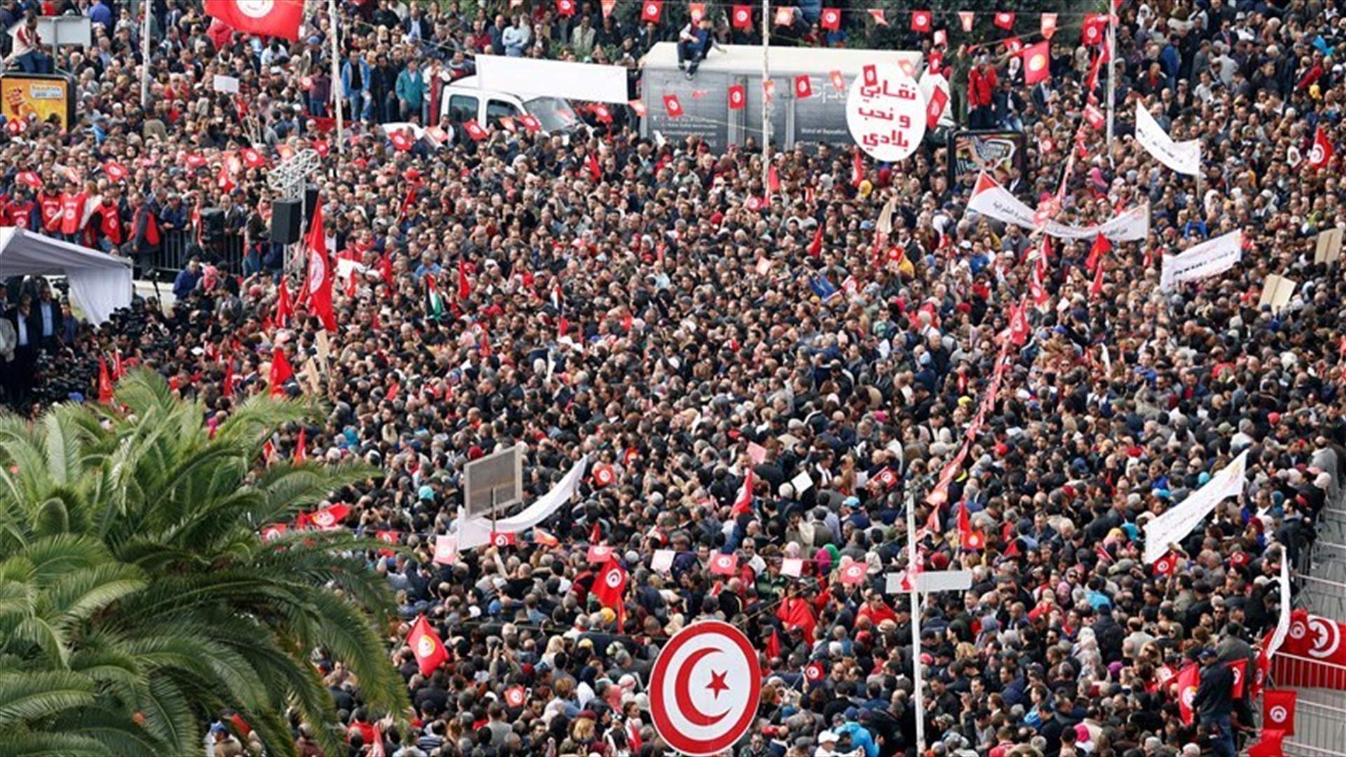 Tunisian public workers protest over pay, more than half a million strike