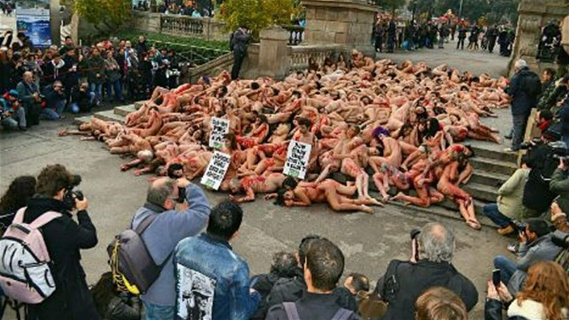 Demonstrators strip naked in Barcelona to protest at fur, leather use