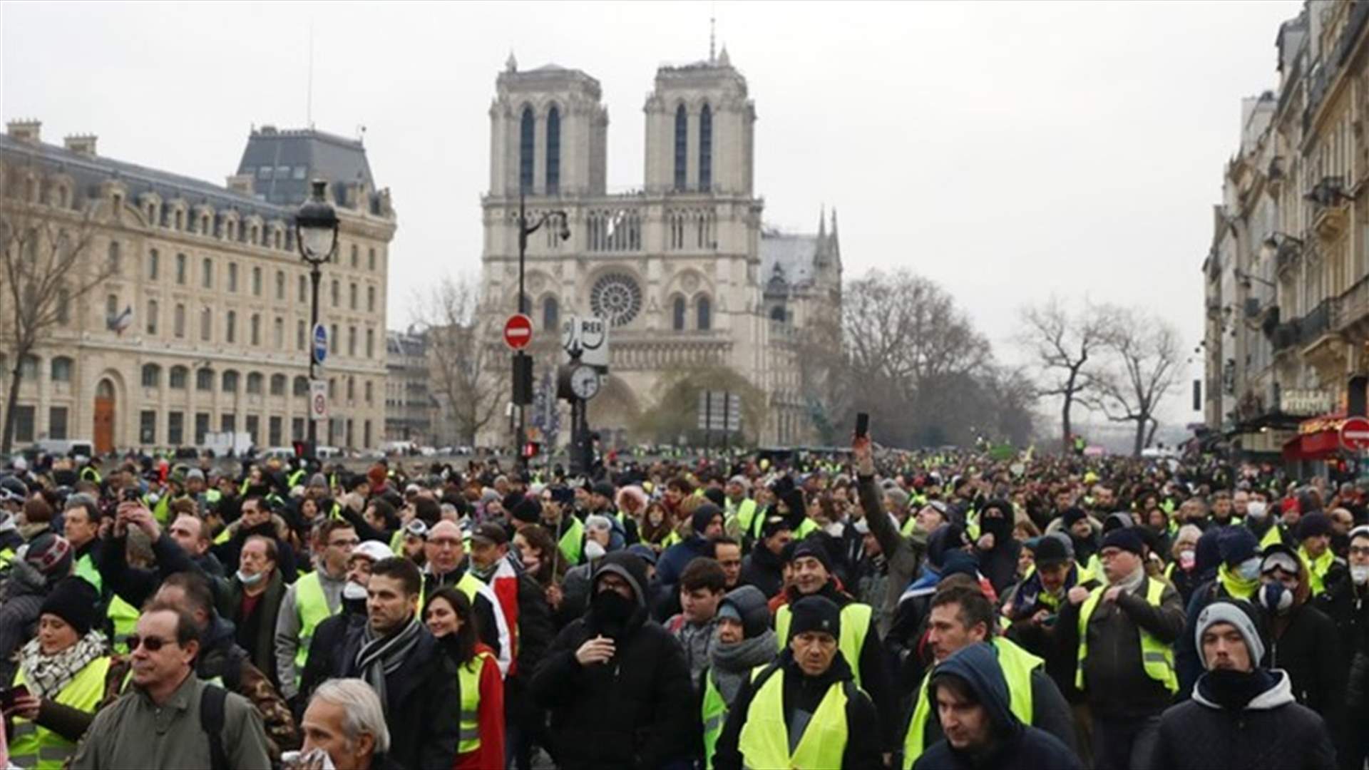 Clashes erupt in Paris as 'yellow vests' protest at unrepentant Macron
