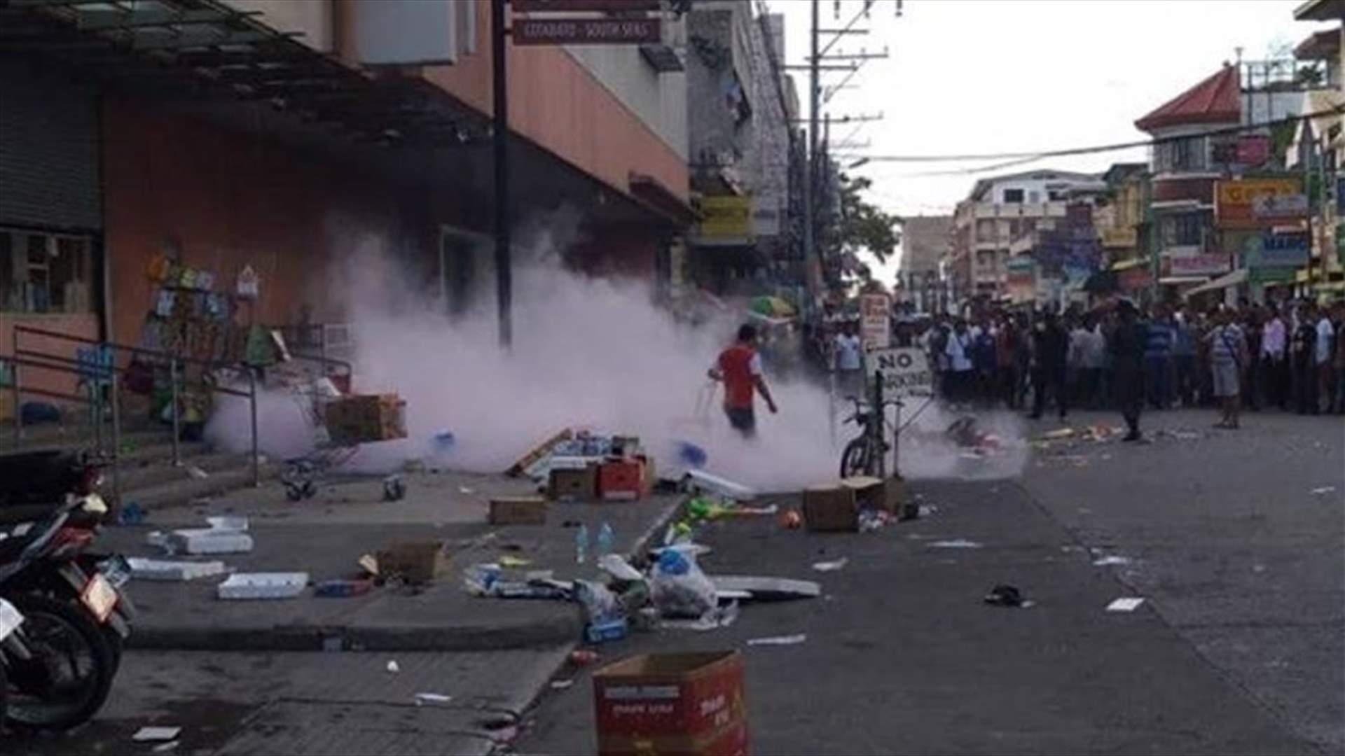 Philippines vows to crush 'terrorists' after church bombs kill 27