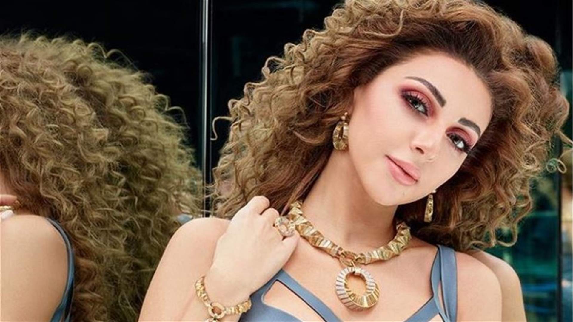 جلسة تصوير لميريام فارس على الثلج مع ابنها (صور)