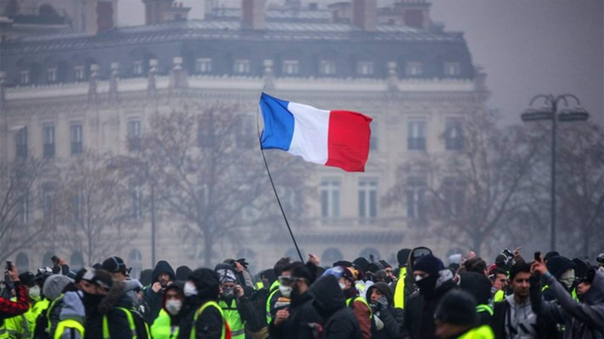 Clashes erupt in 'yellow vest' protests as Macron prepares policy moves