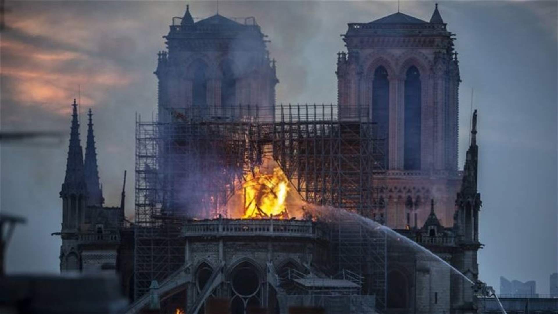 Notre-Dame smolders as investigation begins