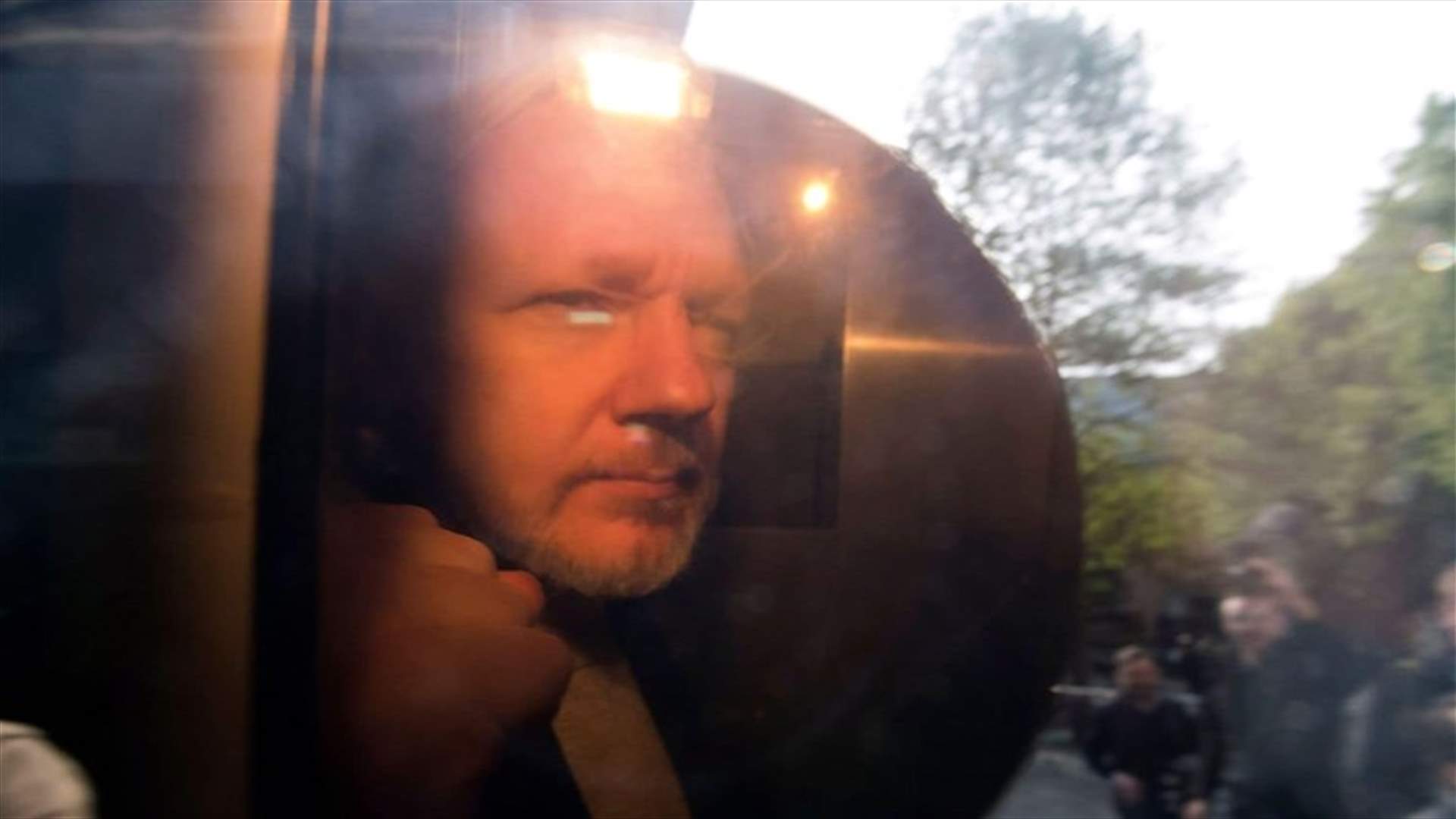 Julian Assange sentenced to 50 weeks in British jail for skipping bail