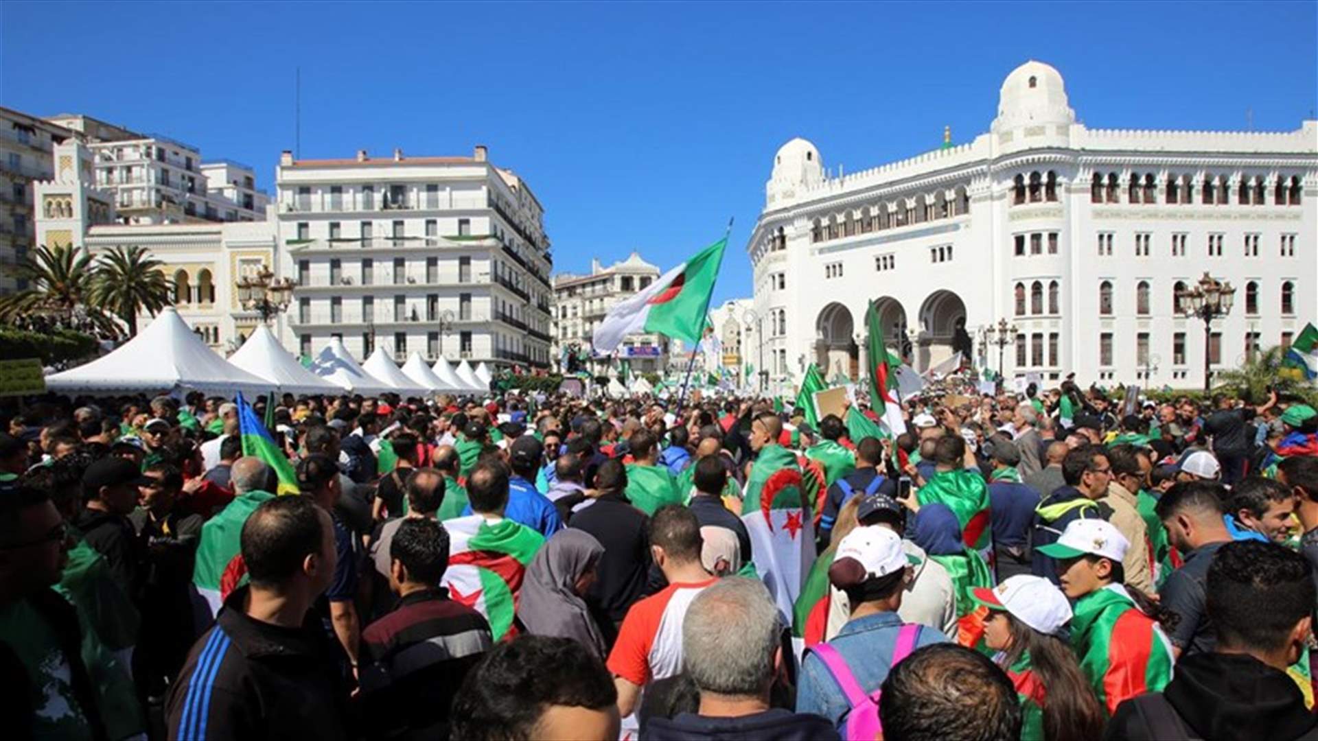Thousands protest again against ruling elite in Algeria