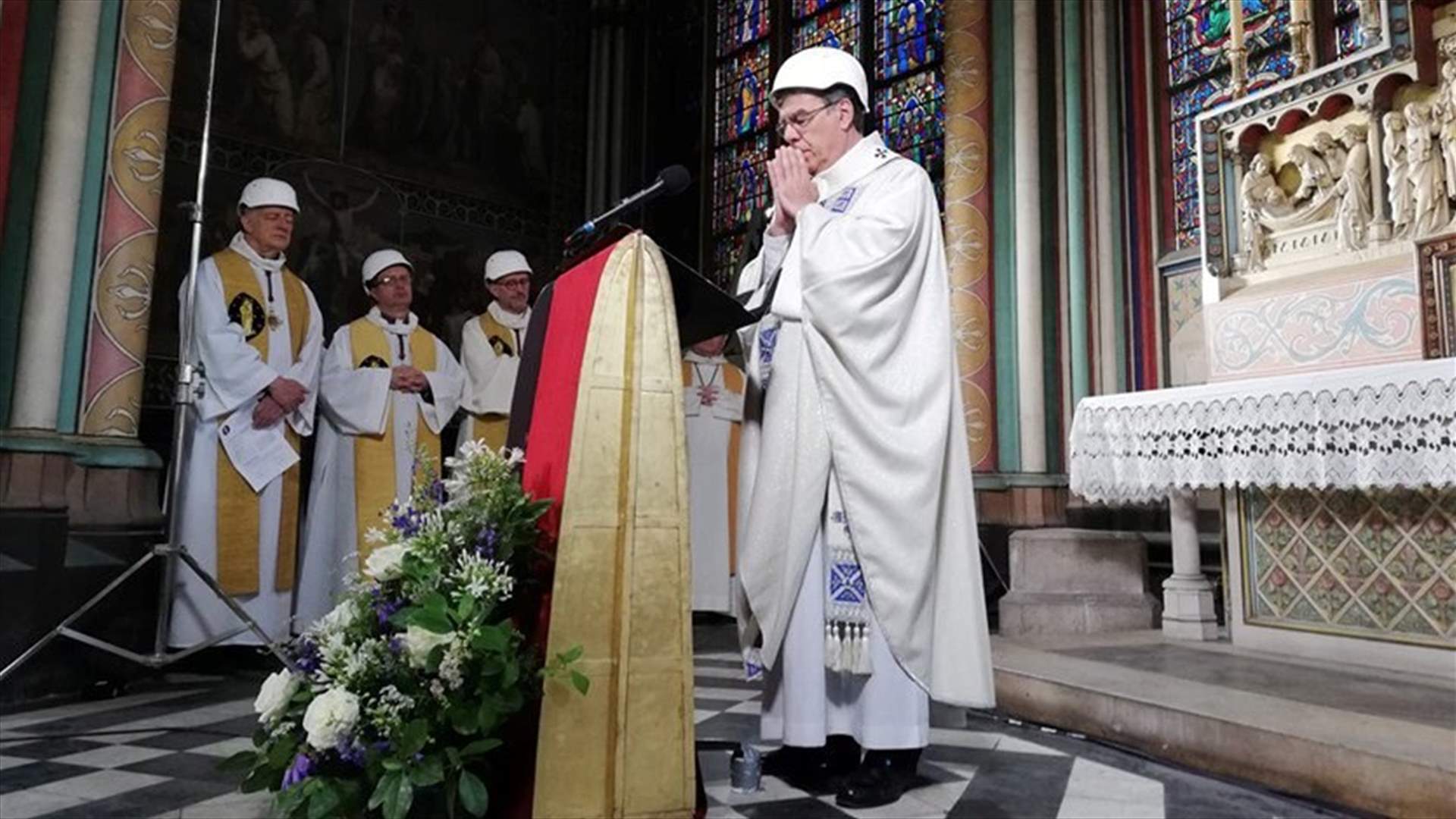 Worshippers in safety hats attend Notre-Dame's first mass since fire