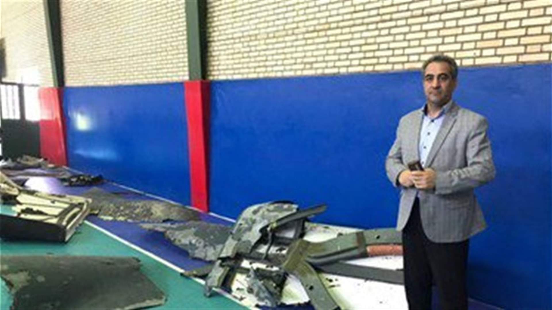 Iran displays debris said to prove US drone had been over Iranian territorial waters