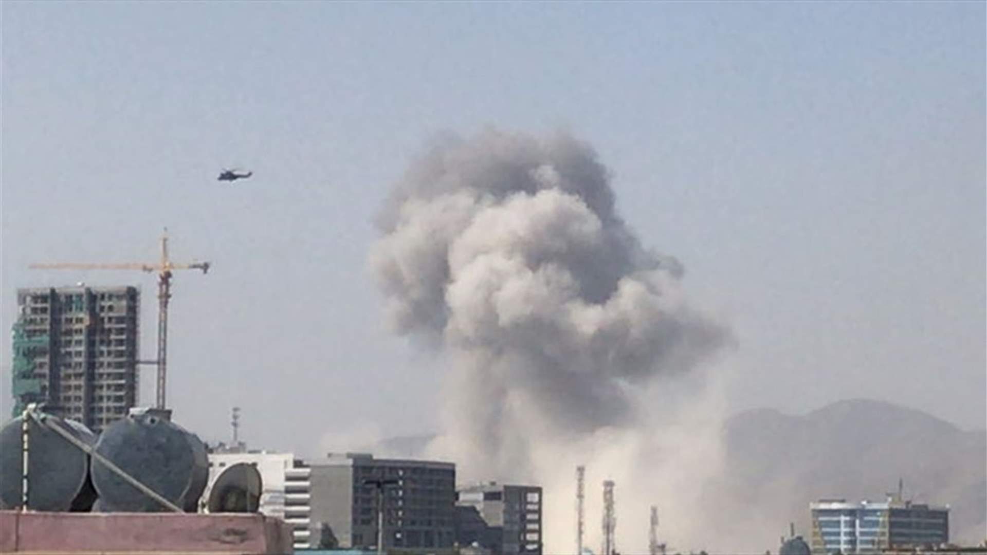 Gun battle rages in Afghan capital after Taliban blast injures 100