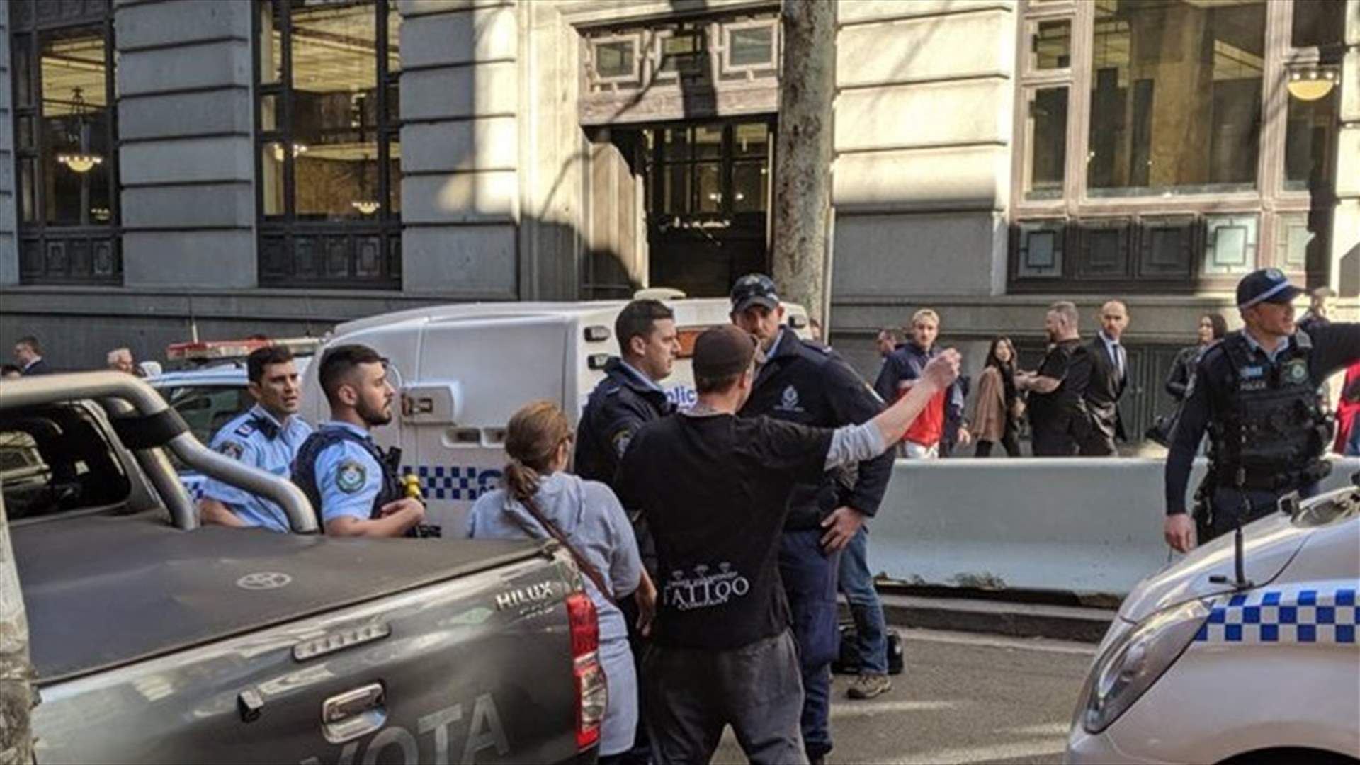 Woman stabbed, knife-wielding man restrained by public in Sydney
