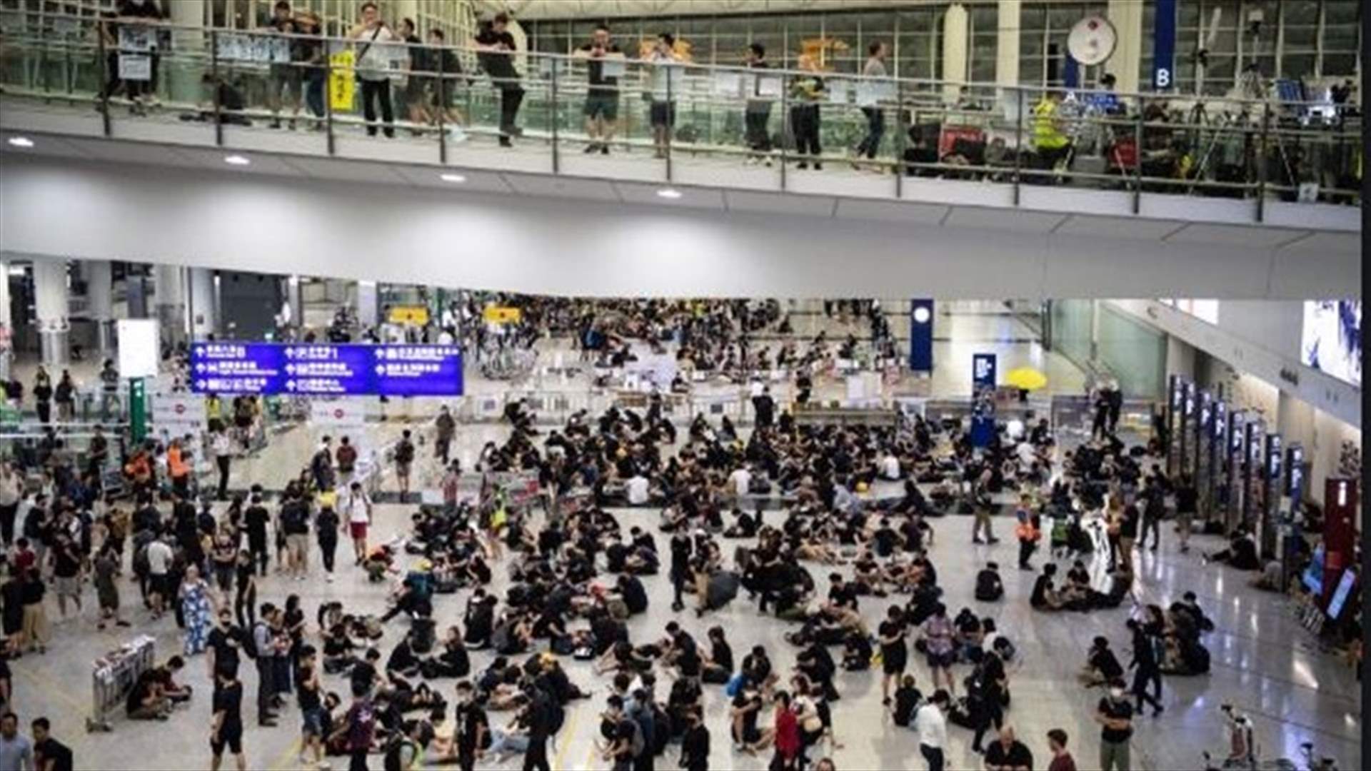 Hong Kong airport suspends check-in as leader bemoans &#39;panic and chaos&#39;