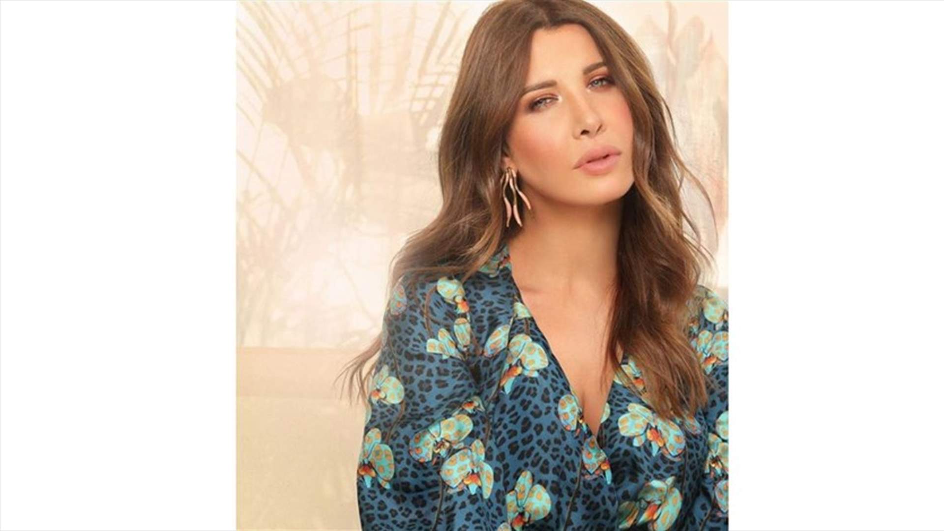 صورة عفوية لنانسي عجرم من تصوير زوجها... شاهدوا إطلالتها الصيفية!