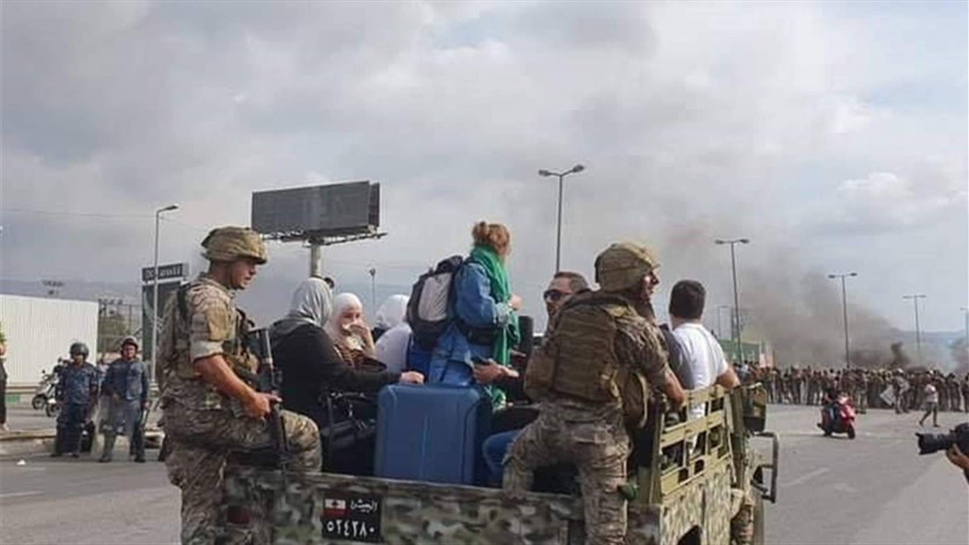 Army truck transports travelers to Beirut airport