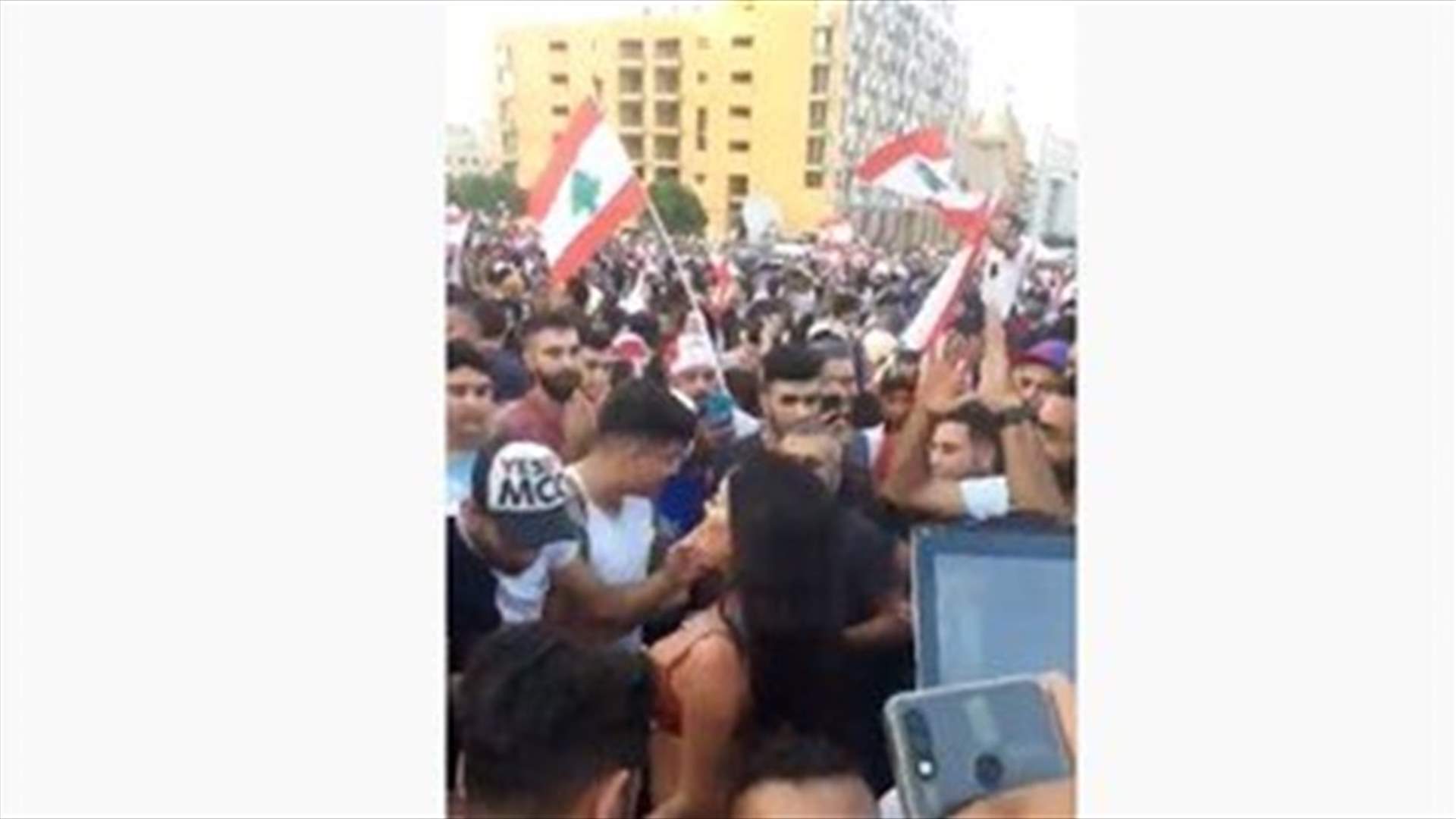 Belly dancer dances among protesters in Beirut downtown-[VIDEO]