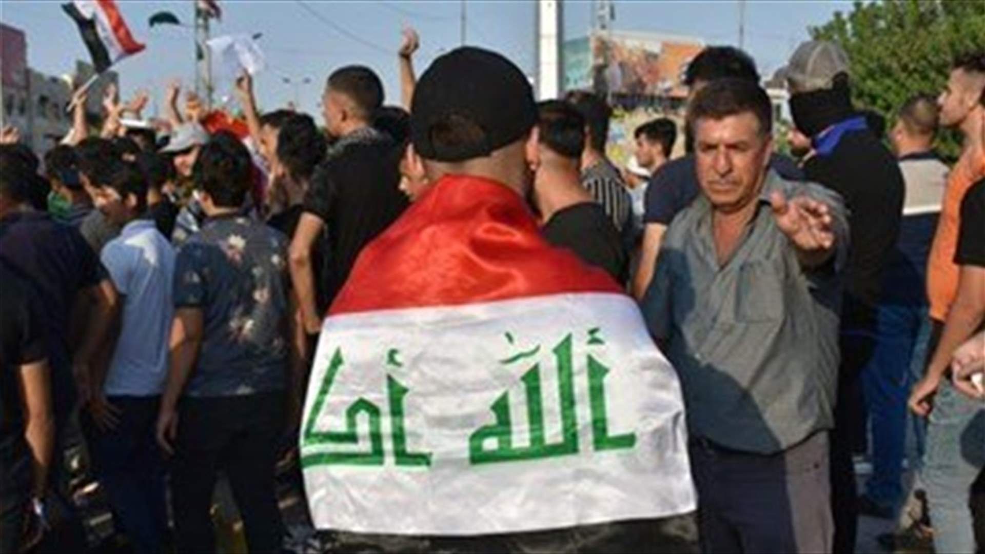 Iraqi security forces open fire on protesters, kill 14
